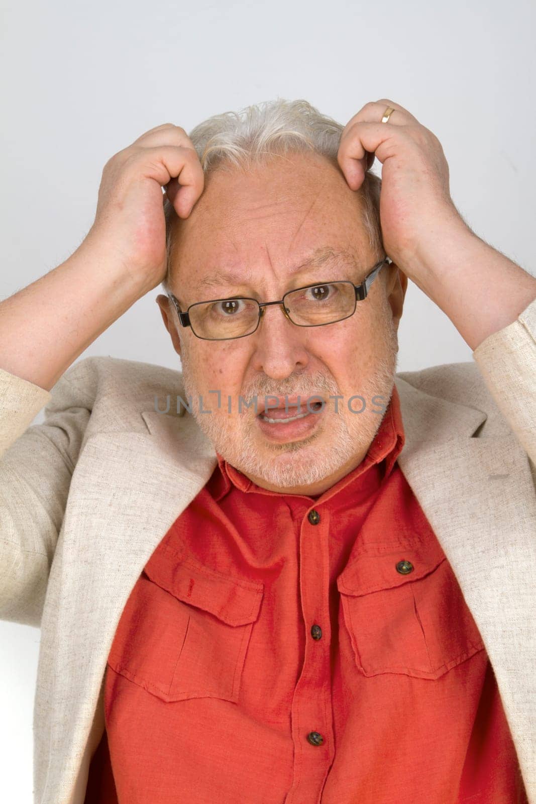 Senior in fear and panic on a bright background