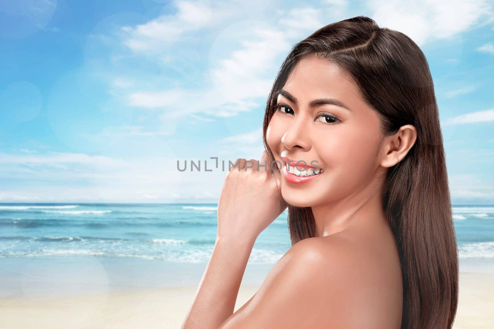 Portrait of a beautiful asian woman with perfect skin and make-up on vacation at beach