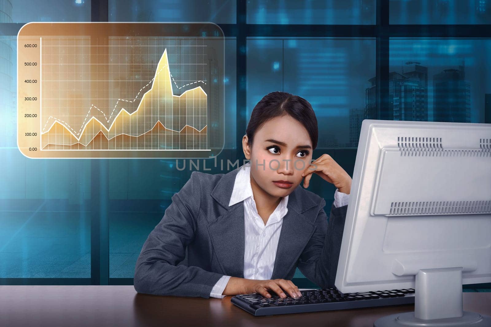 Asian business woman working with computer with virtual market chart on digital background