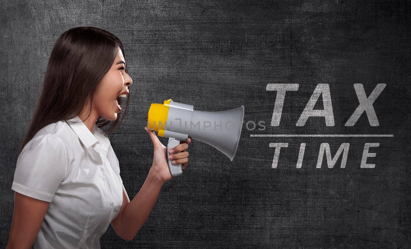 Asian business woman holding megaphone with TAX TIME announcement in the blackboard