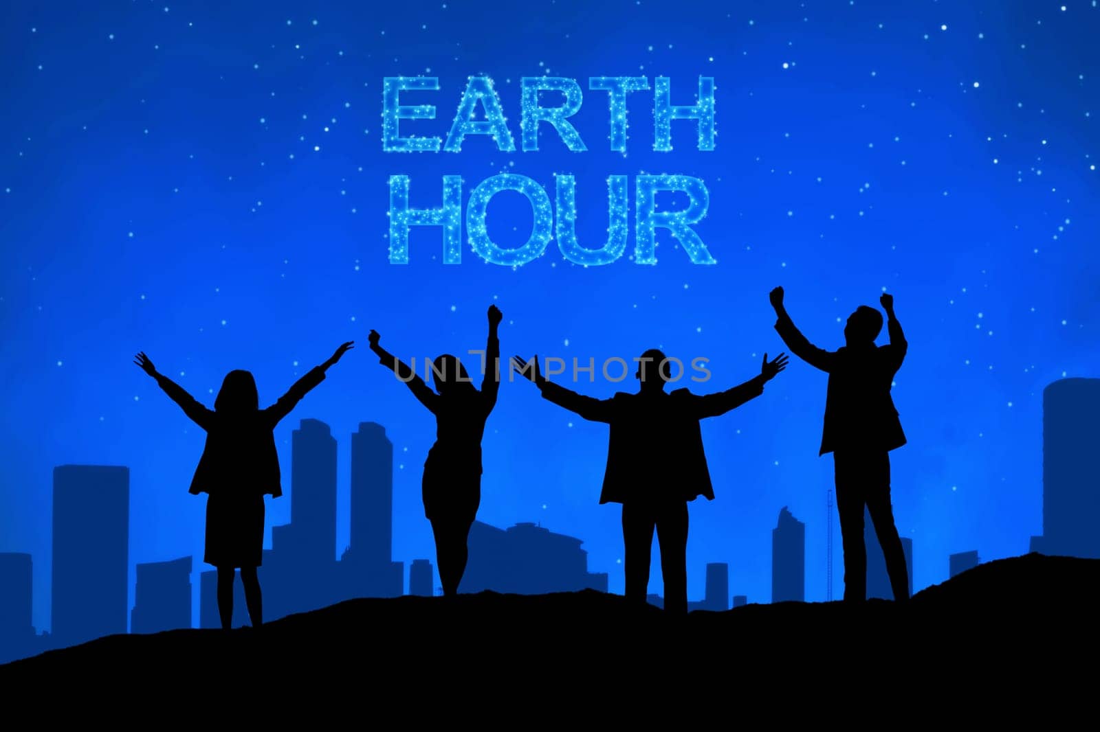 Silhouette of business people with Earth hour message at night
