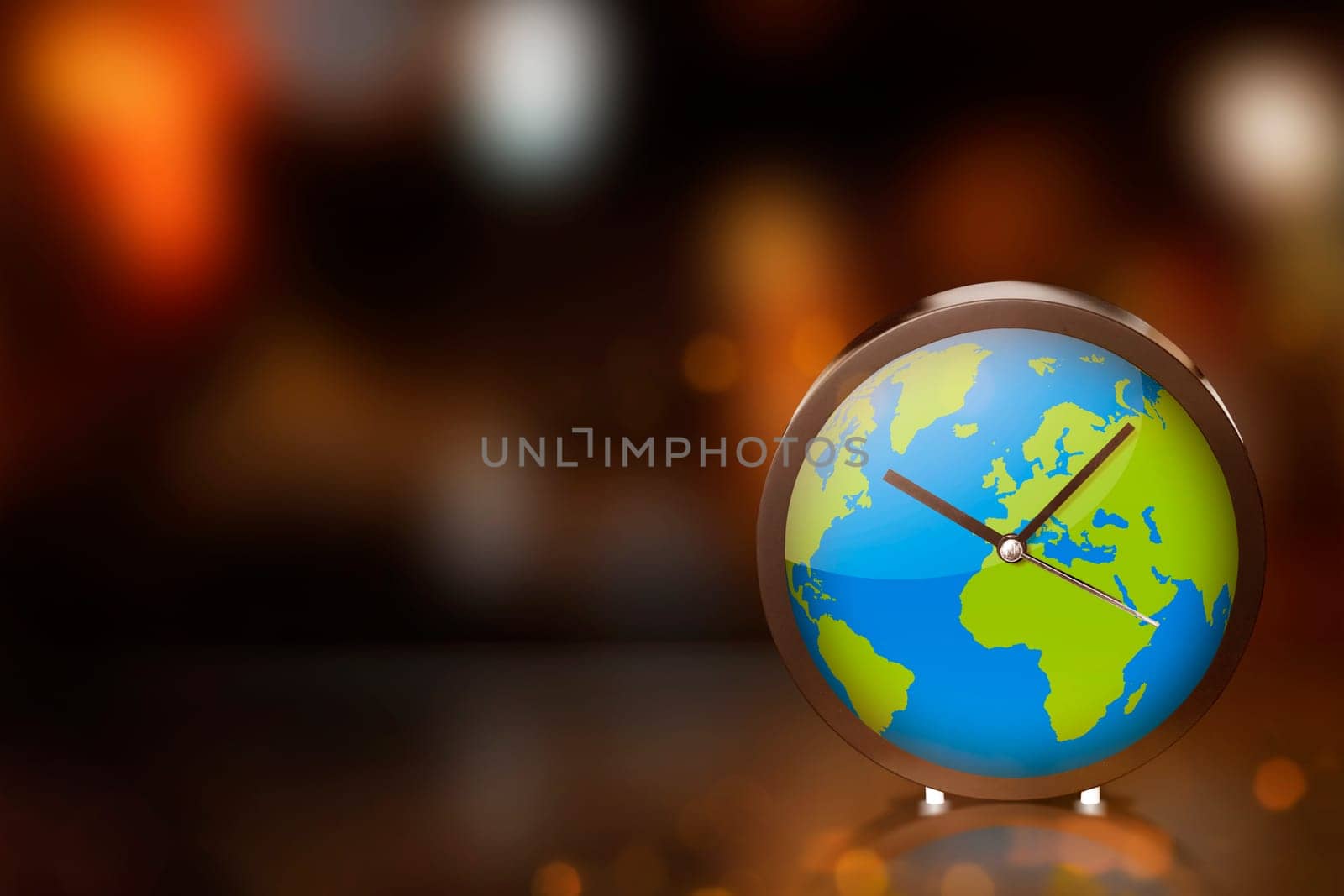 Earth clock with blurred light on dark room. Earth Hour Concept.