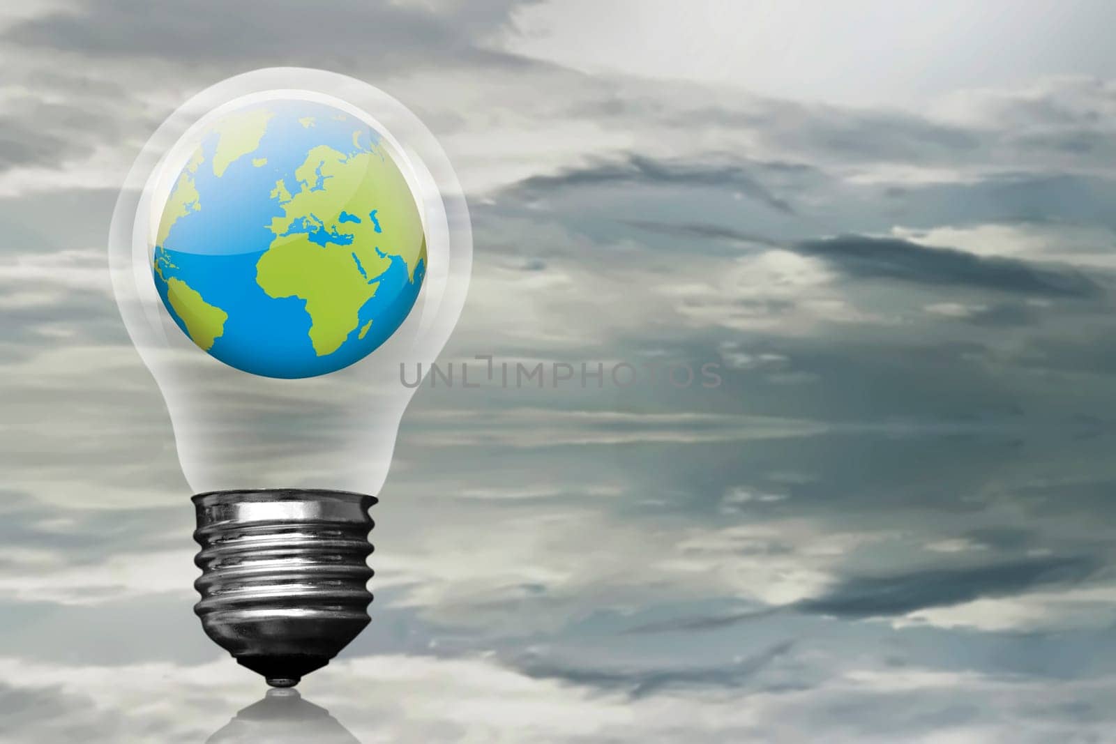 Earth planet inside light bulb over dark skyline background