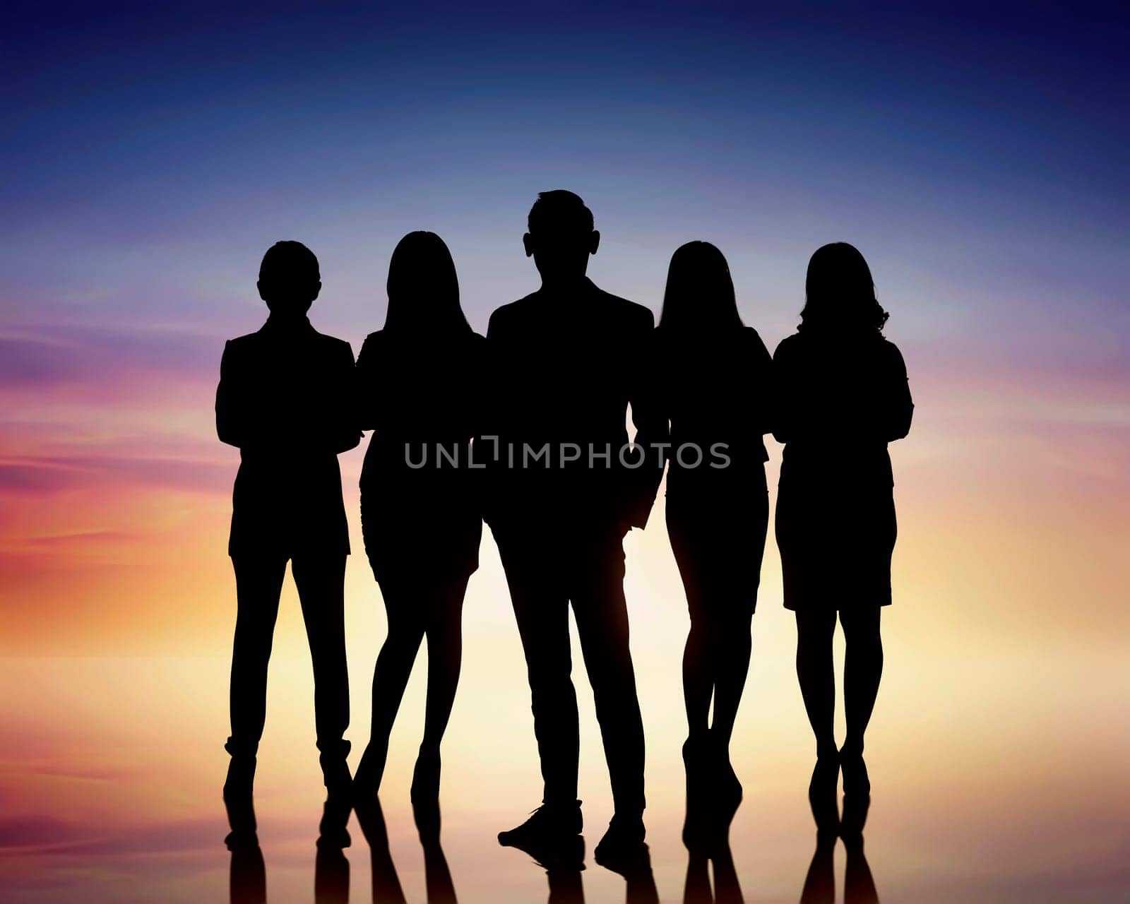 Silhouettes of group business people against colorful background