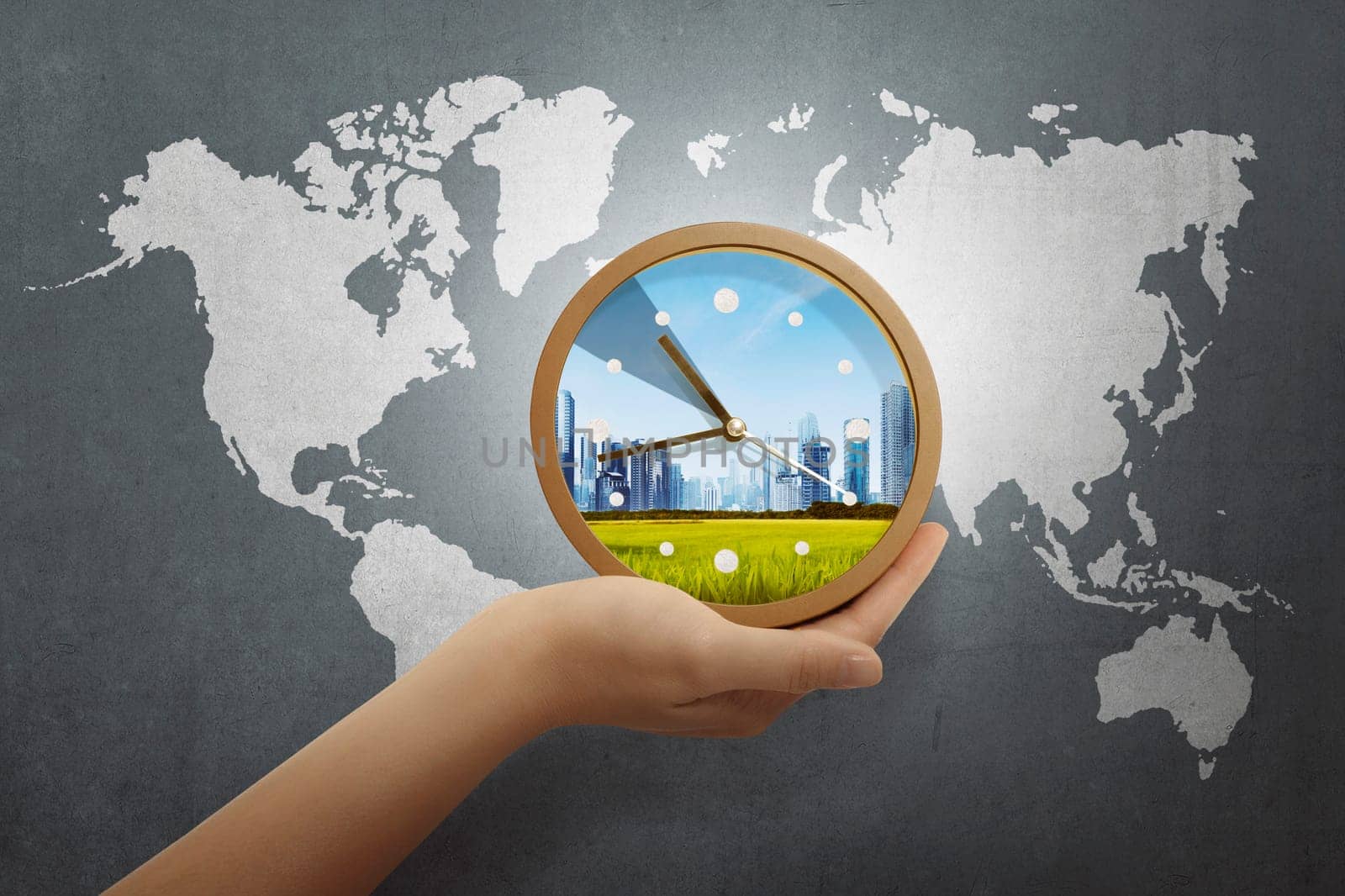 People hand holding clock with world map on gray background