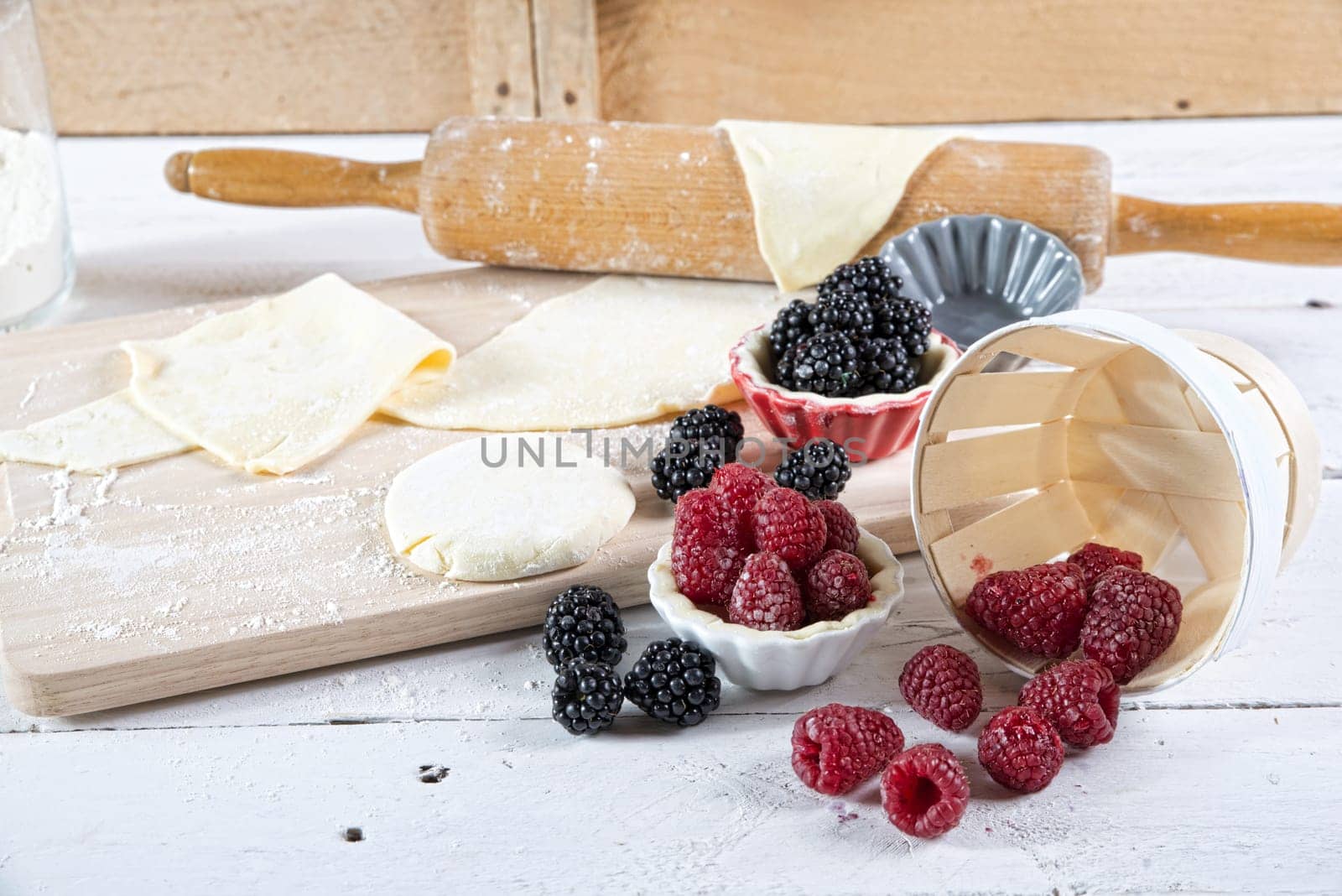 preparation for cake with red fruit with dough
