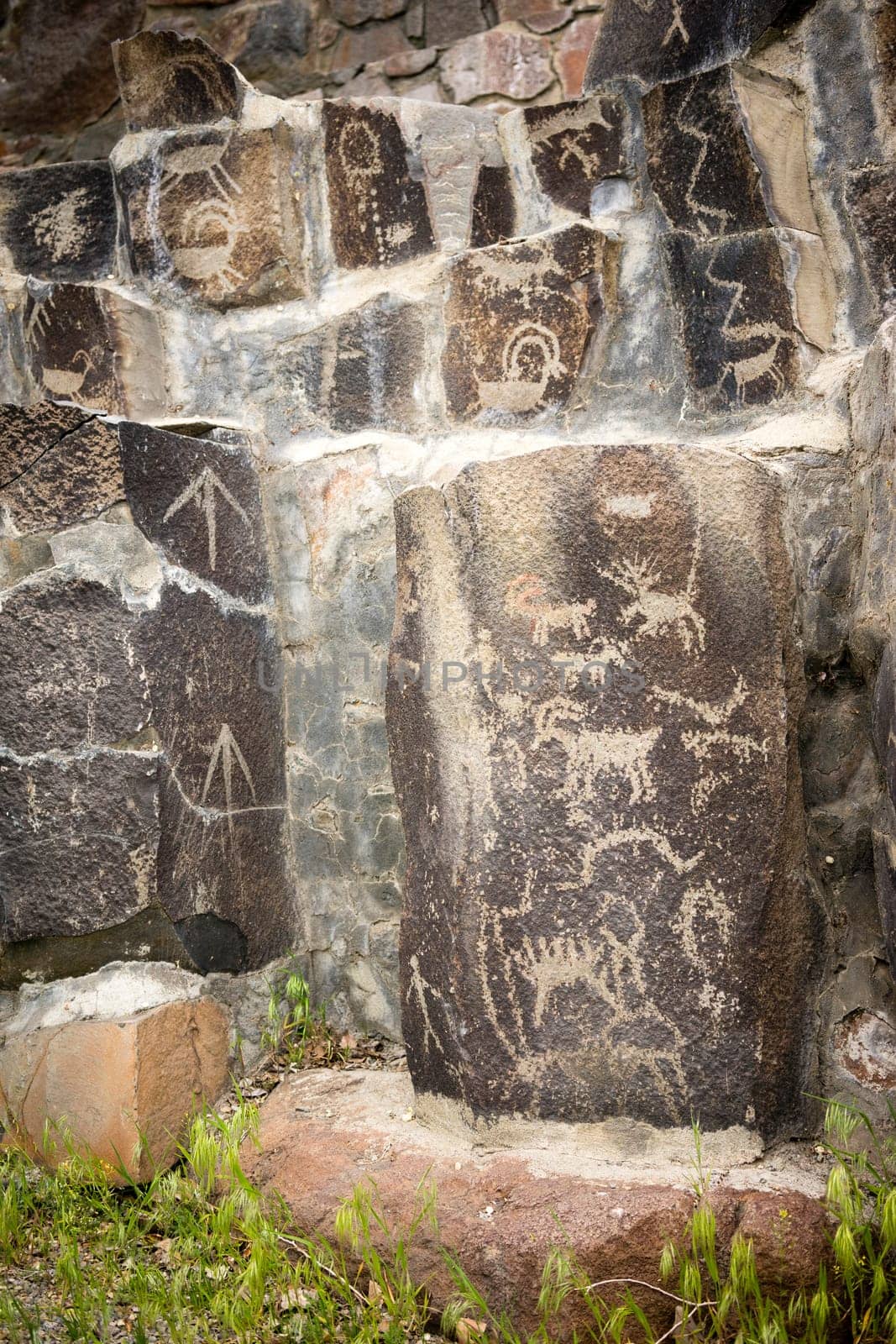 Primitive rock drawings hundreds of years old we call Petroglyphs