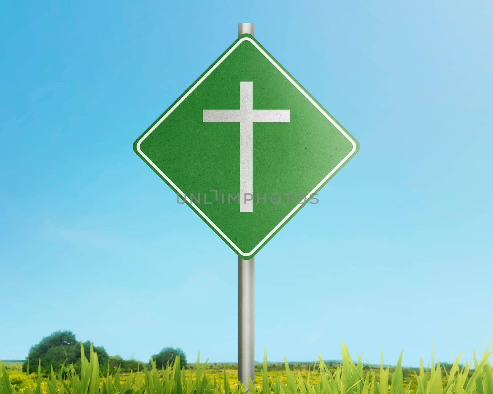 Traffic road with christian cross on meadow field