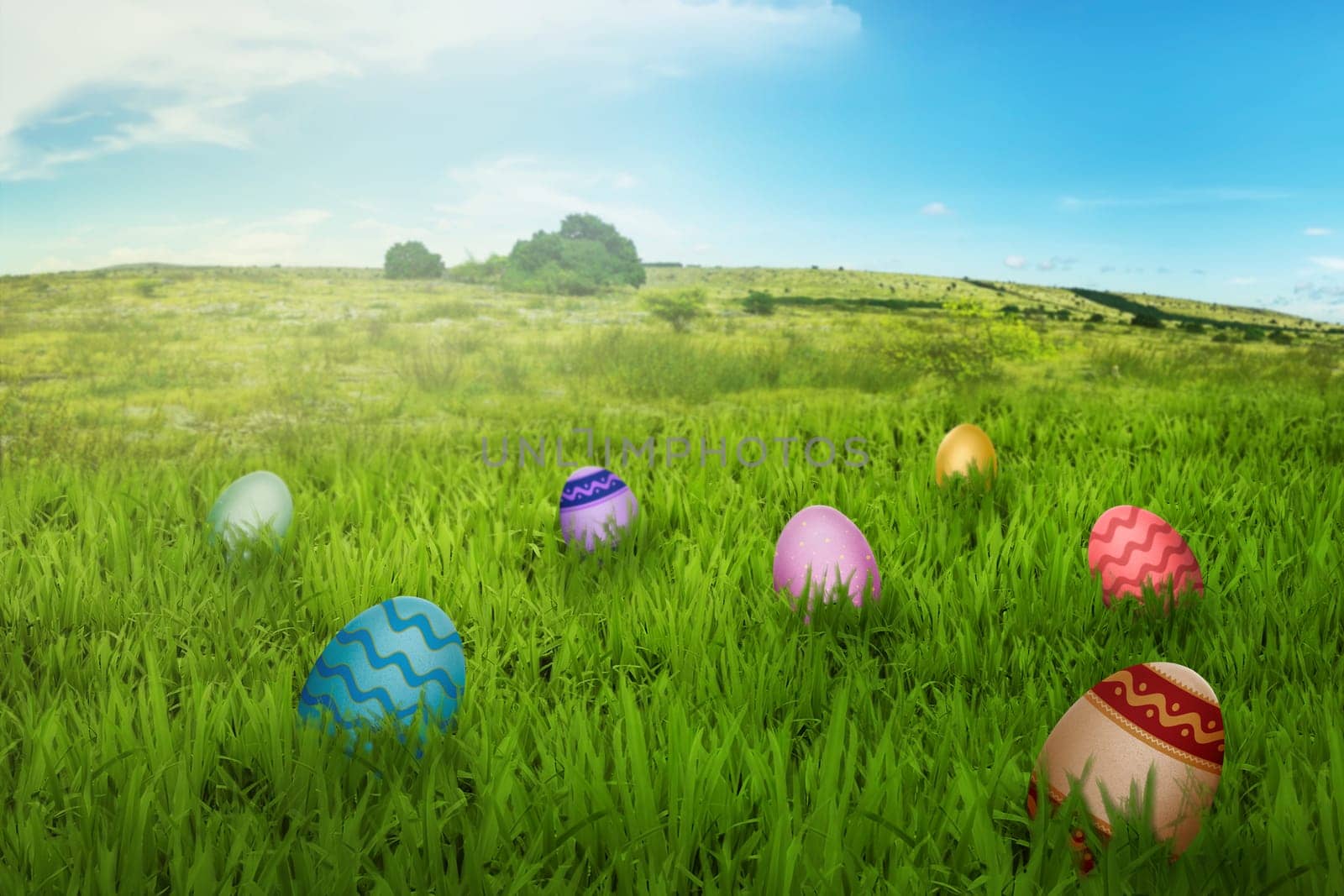 Colorful easter eggs in the meadow with blue sky background