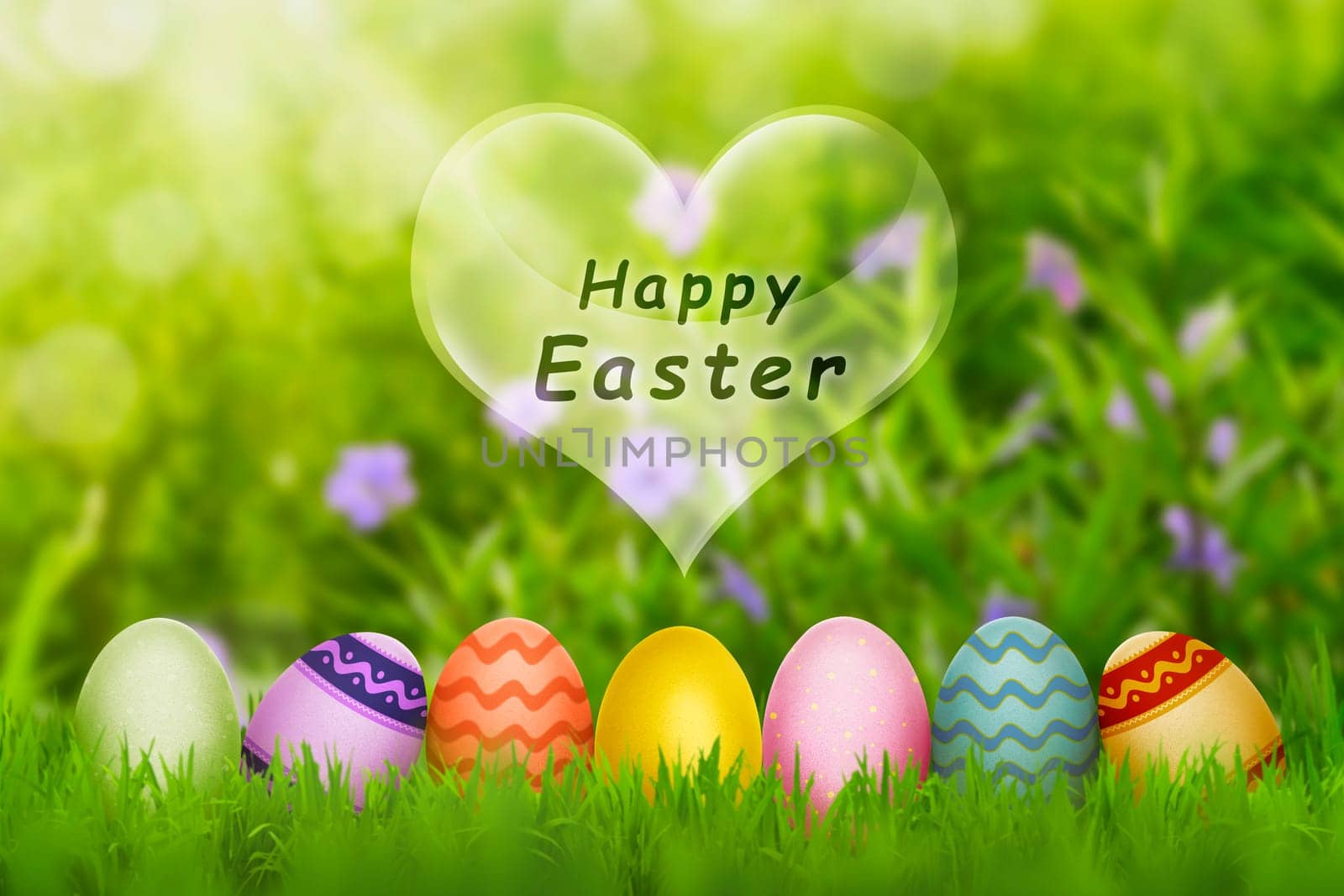 Colorful Easter eggs with fresh green grass on the garden