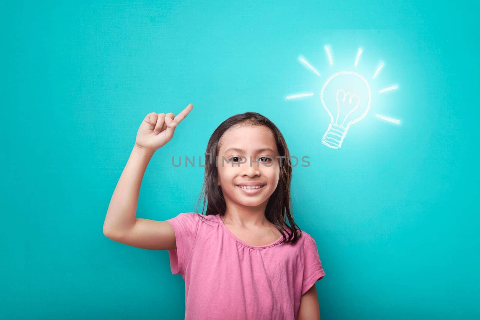 Clever asian child with bright idea symbol above her head over bright background