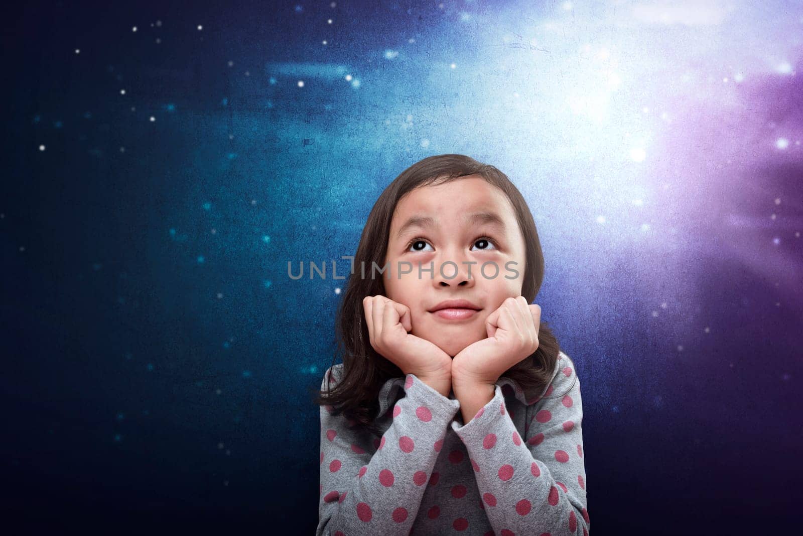 Cheerful asian kid thinking about something over futuristic background
