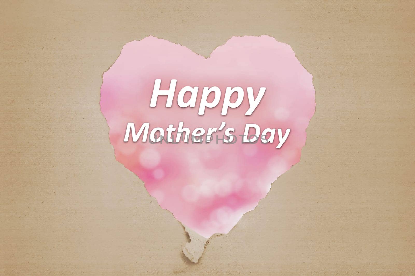 Happy Mothers Day message from ripped paper written over pink background