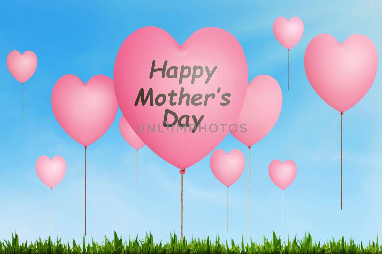 Happy Mothers Day message written on pink balloon with heart shape in the air