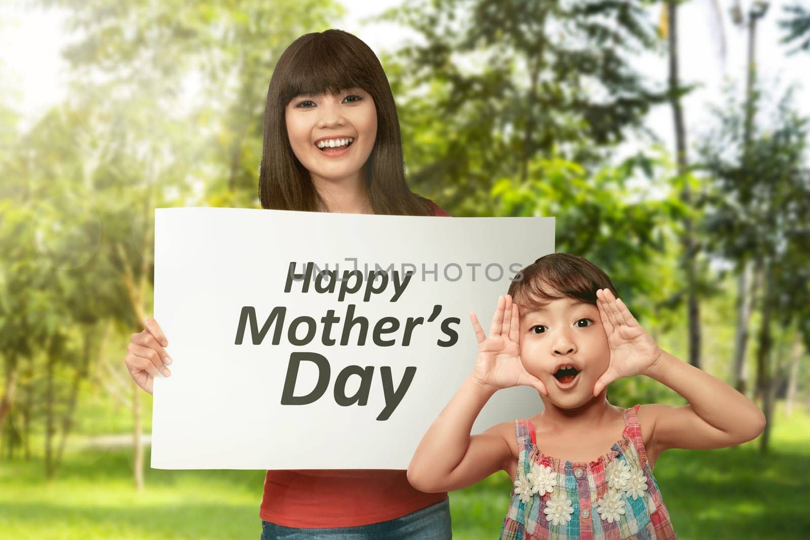 Happy asian woman with her sister celebrate happy mother day on the green field
