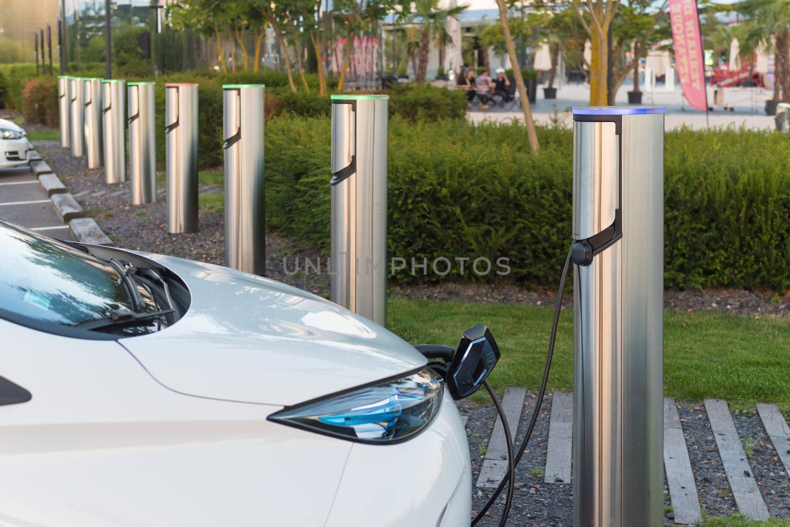 METZ, FRANCE - AUGUST 12, 2016: Renault electric car plugged in at a charging point