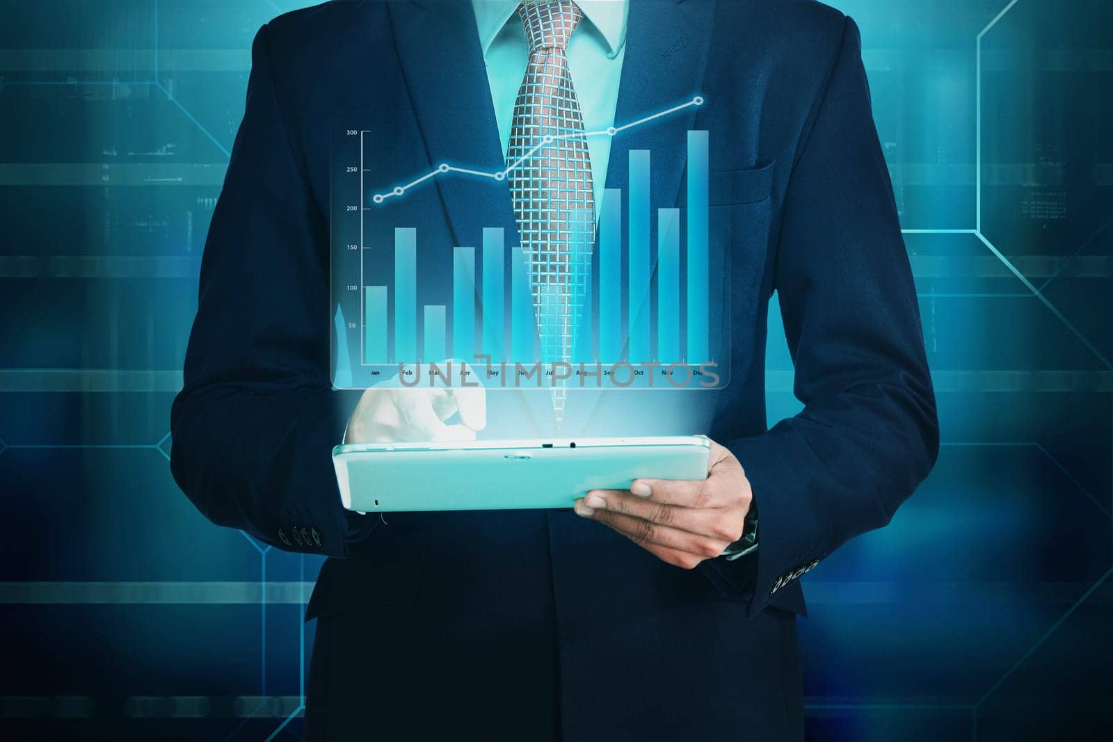 Businessman using the tablet with financial chart hologram against digital background