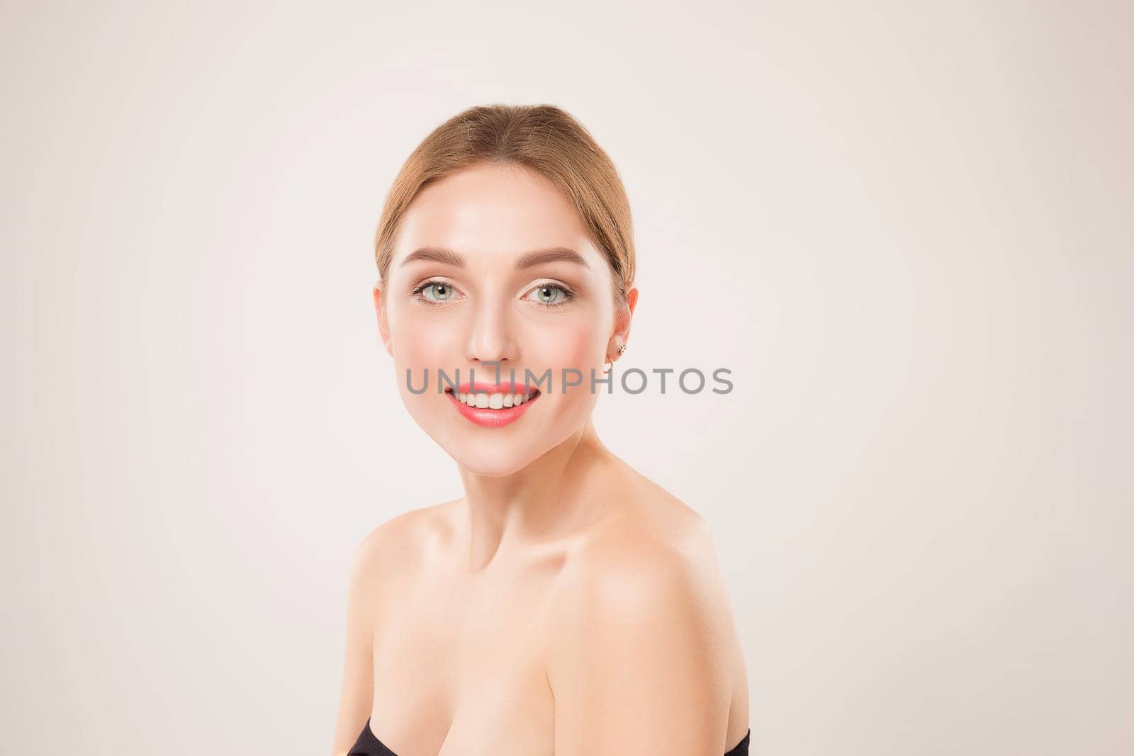 The Beautiful Girl face. Perfect skin and positive emotions. Studio shot