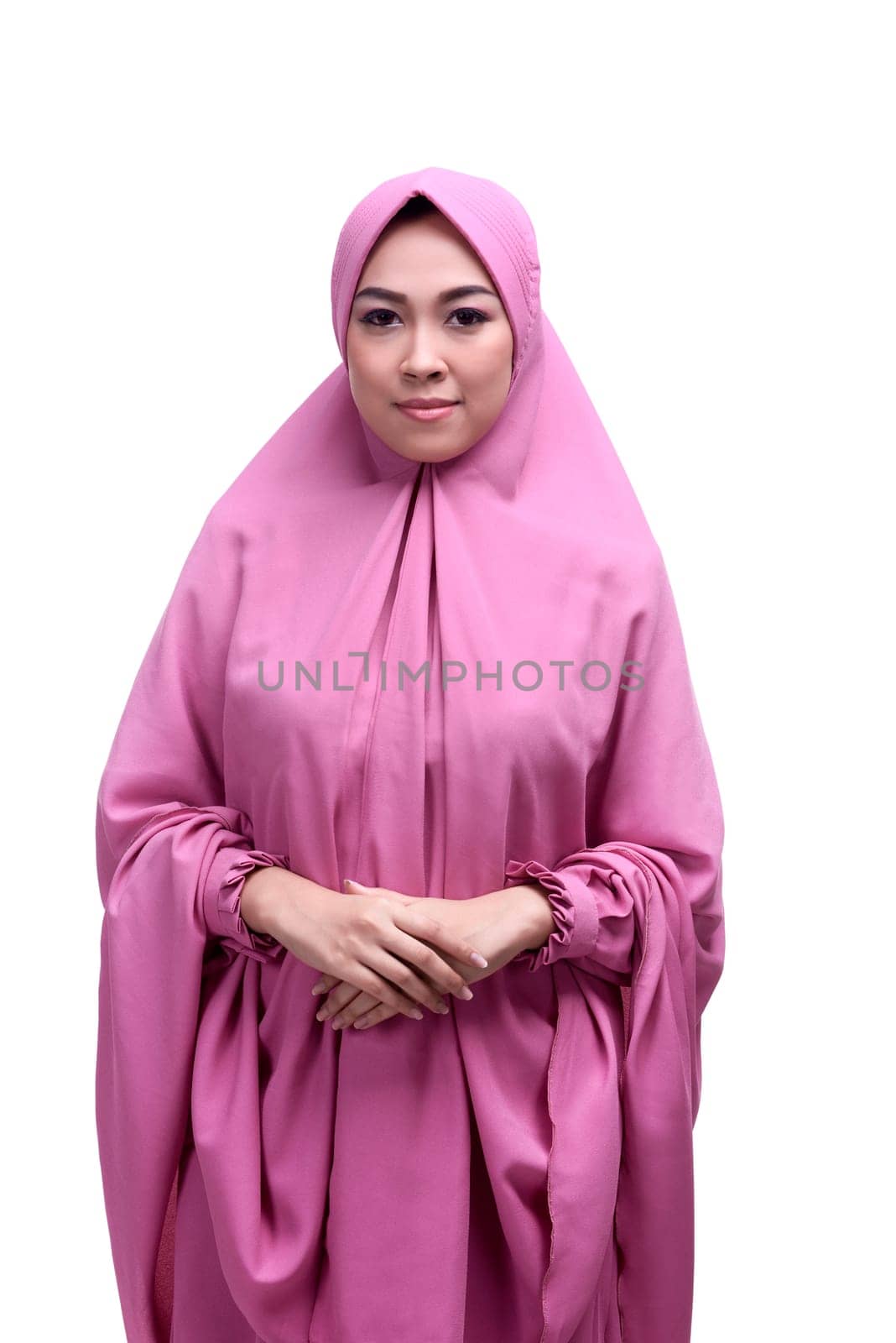 Young asian muslim woman wearing hijab smiling isolated over white background