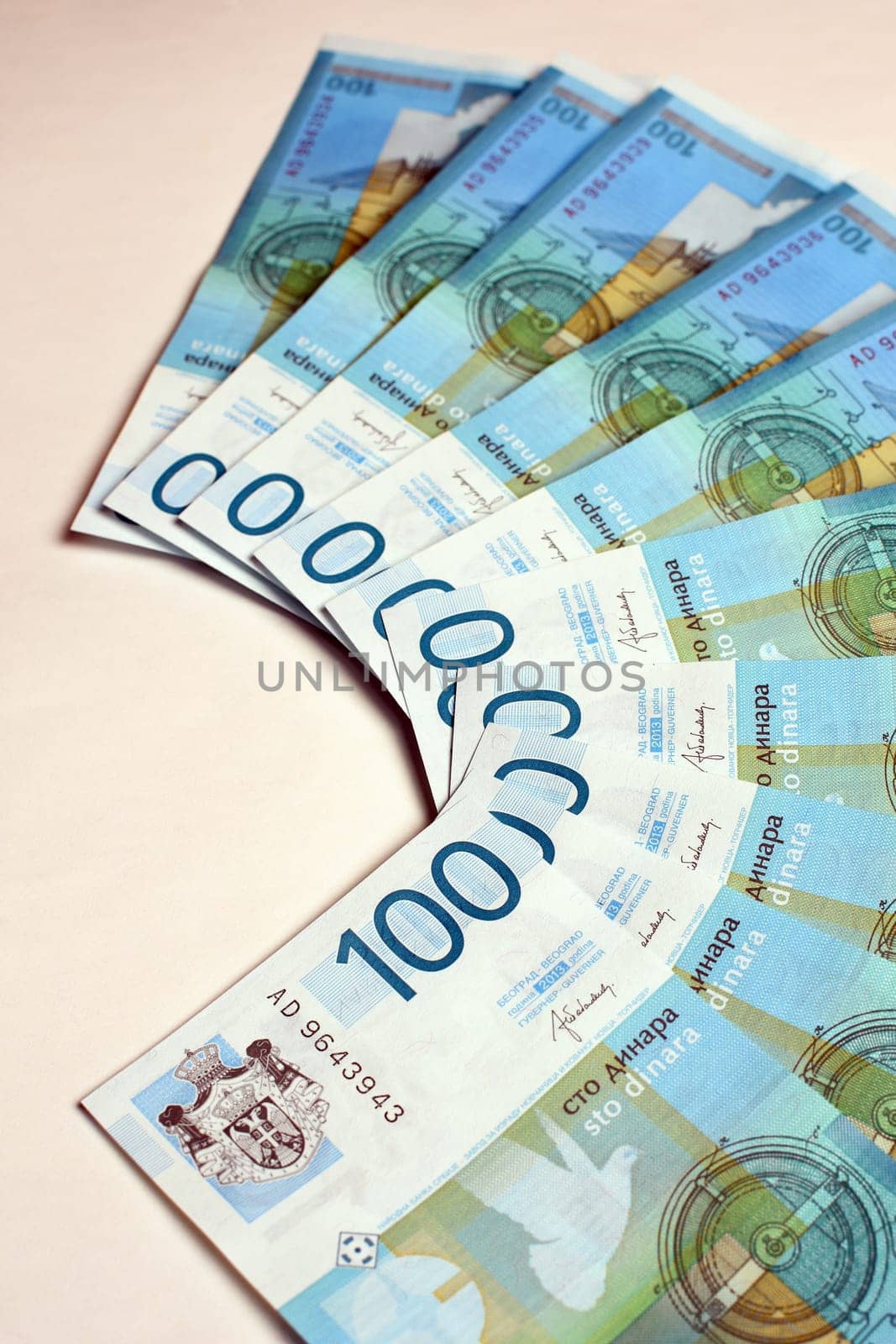 Hundred serbian dinars are on white background.