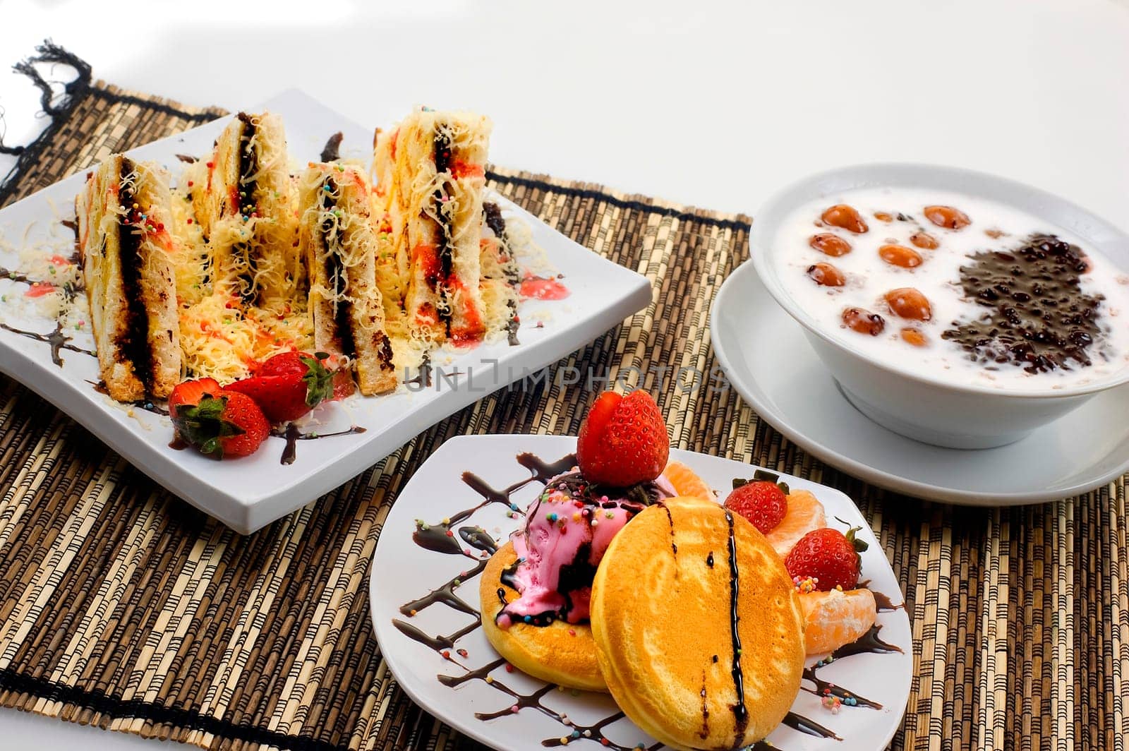 Bread toast with chocolate, candil, and pancake