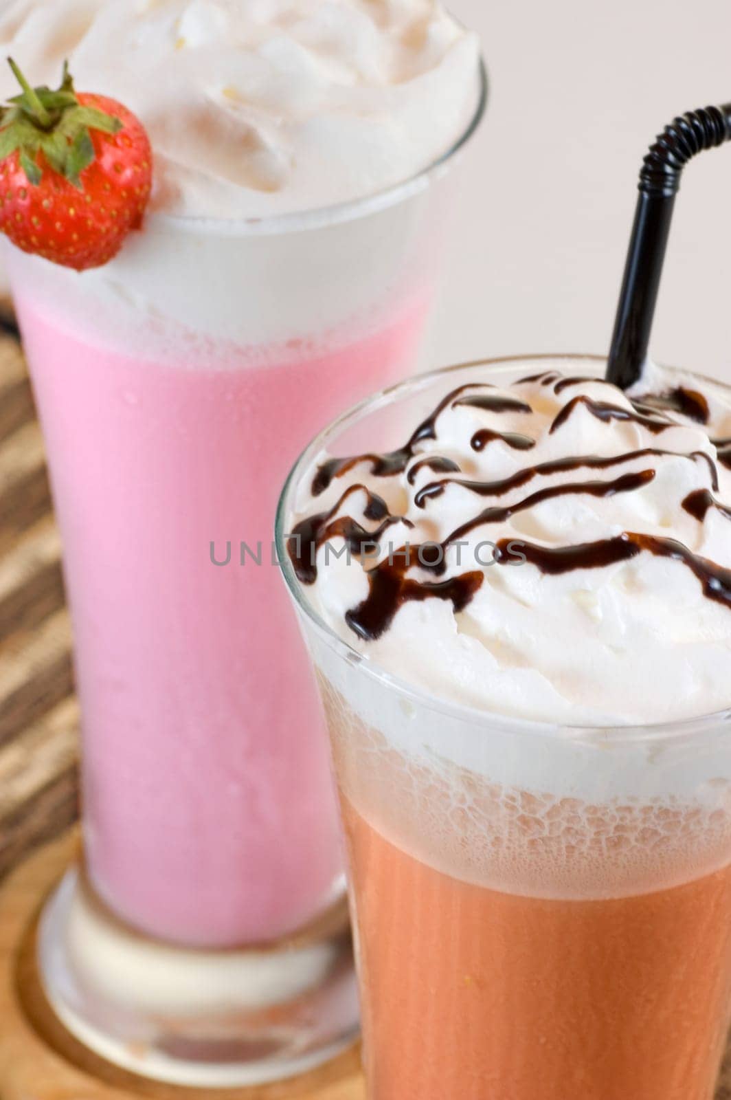 Two glass of strawbery and chocolate milk shake