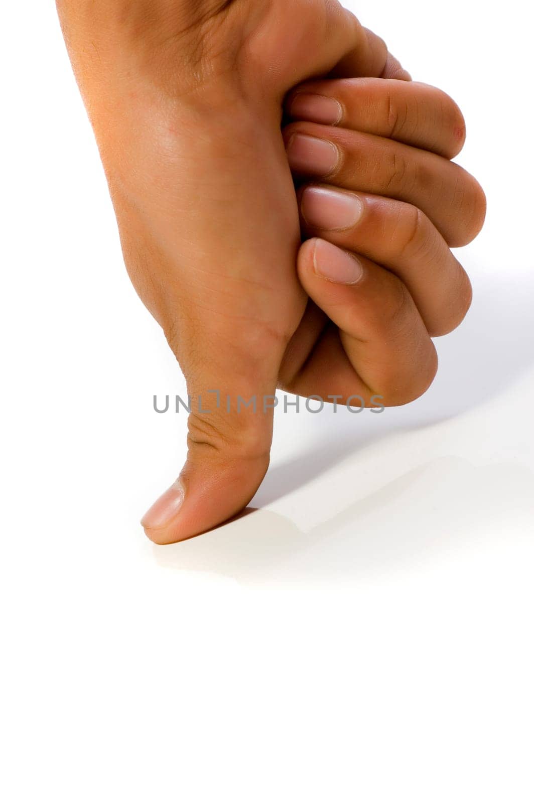 Human thumbs down on white background