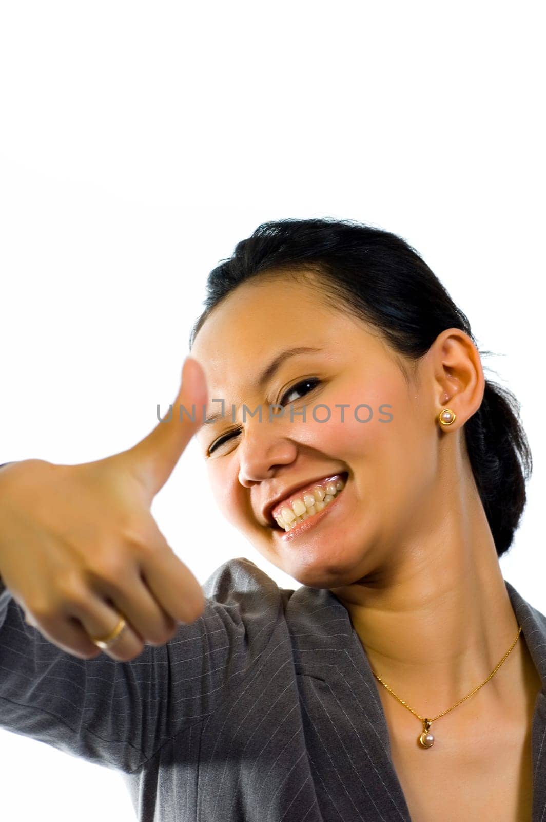 Asian Woman, in Working Suit give her thumb on white background