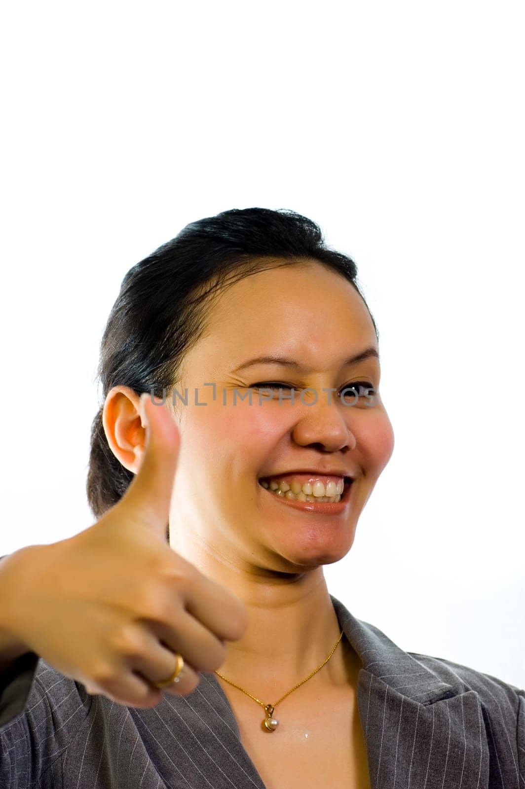 Asian Woman in Working Suit give her thumb on white background