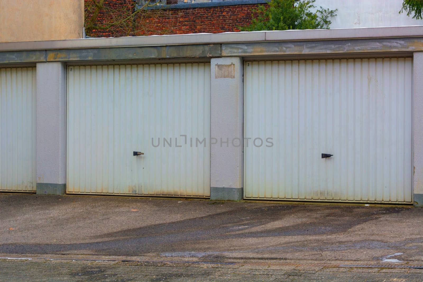 Car rows garages. Car garage yard with closed gates..