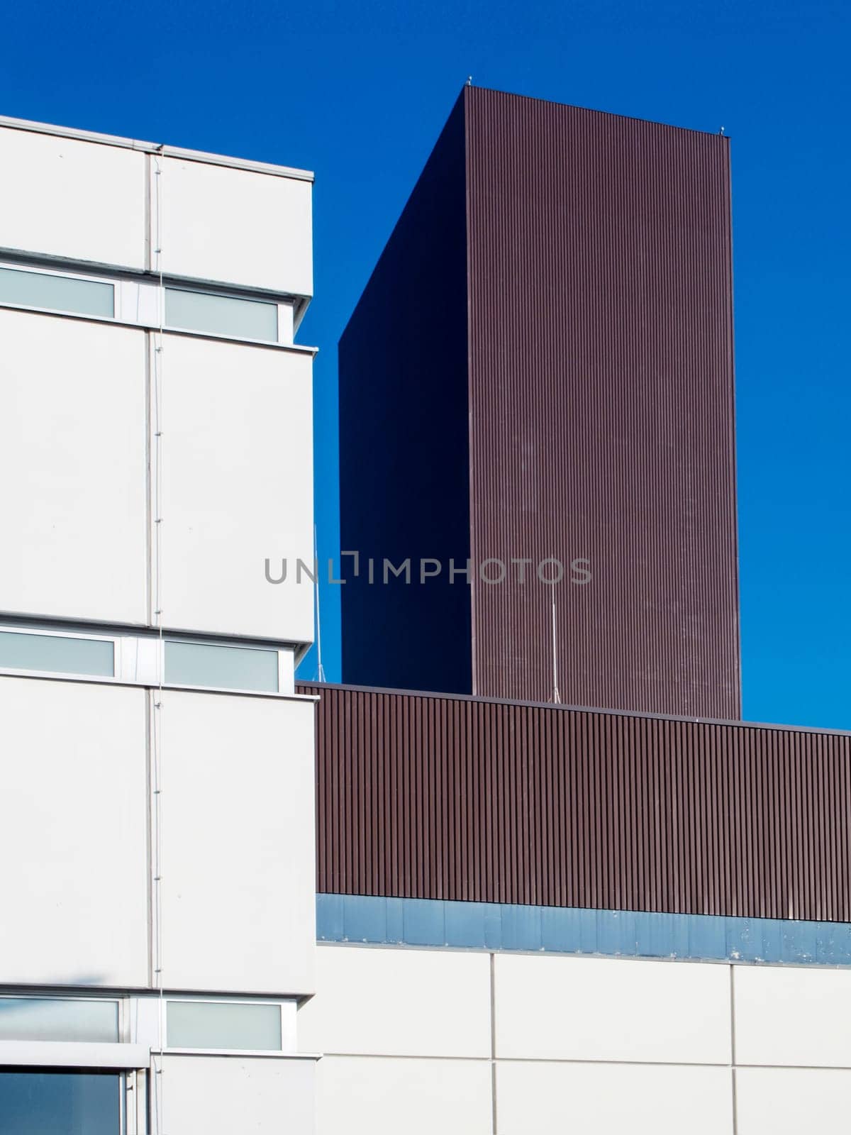 Power plant building. Industrial architecture in Berlin in front of a blue sky in Berlin.