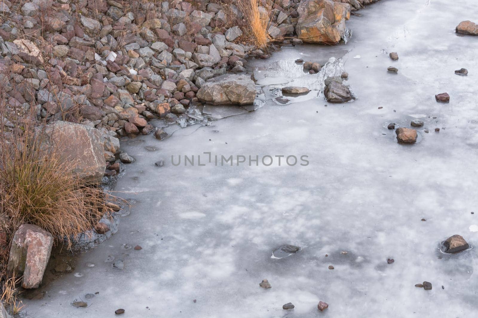 Frozen water surface of a river. The river Ruhr in the city of Essen Kupferdreh..