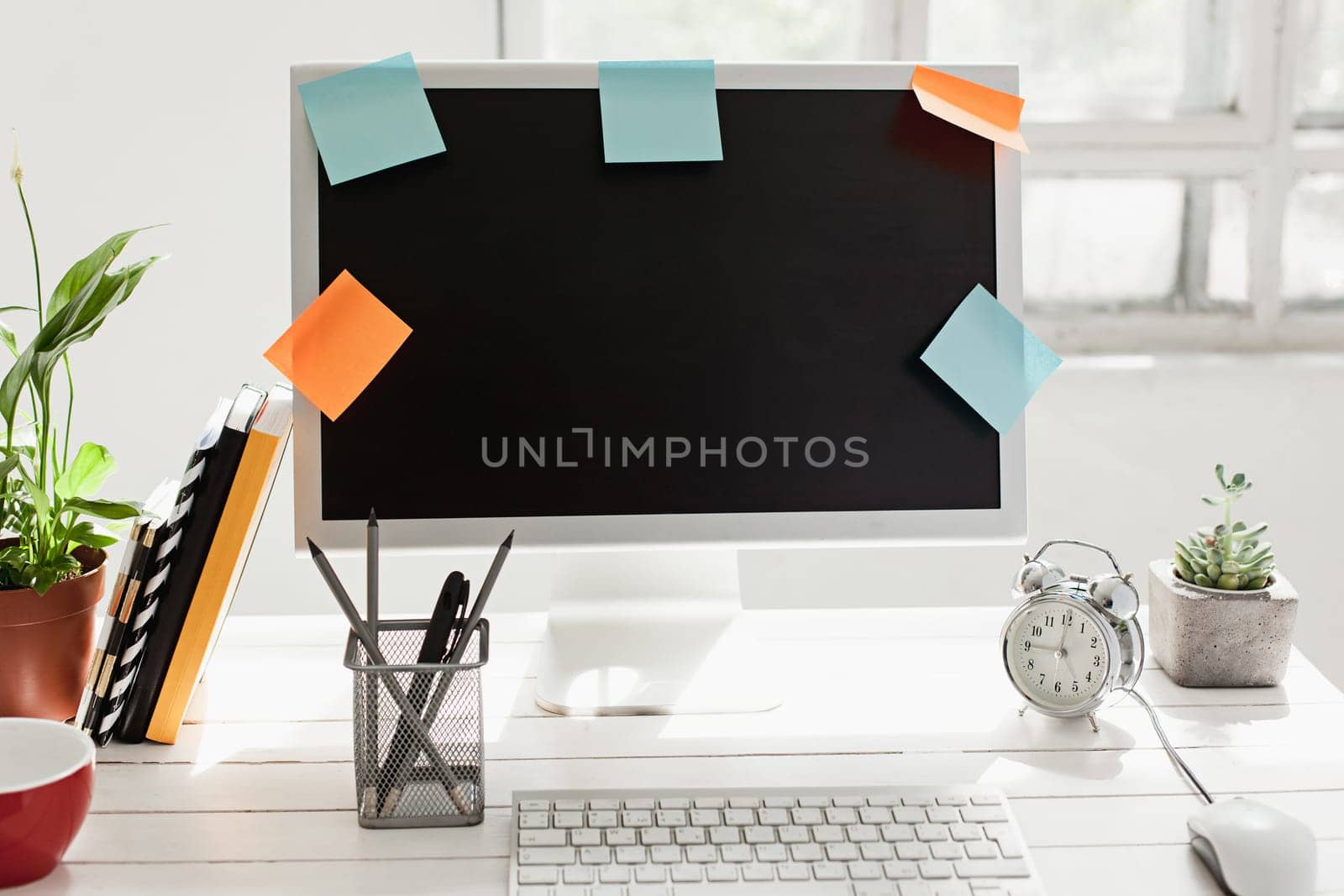 Stylish white workspace with computer on home or studio