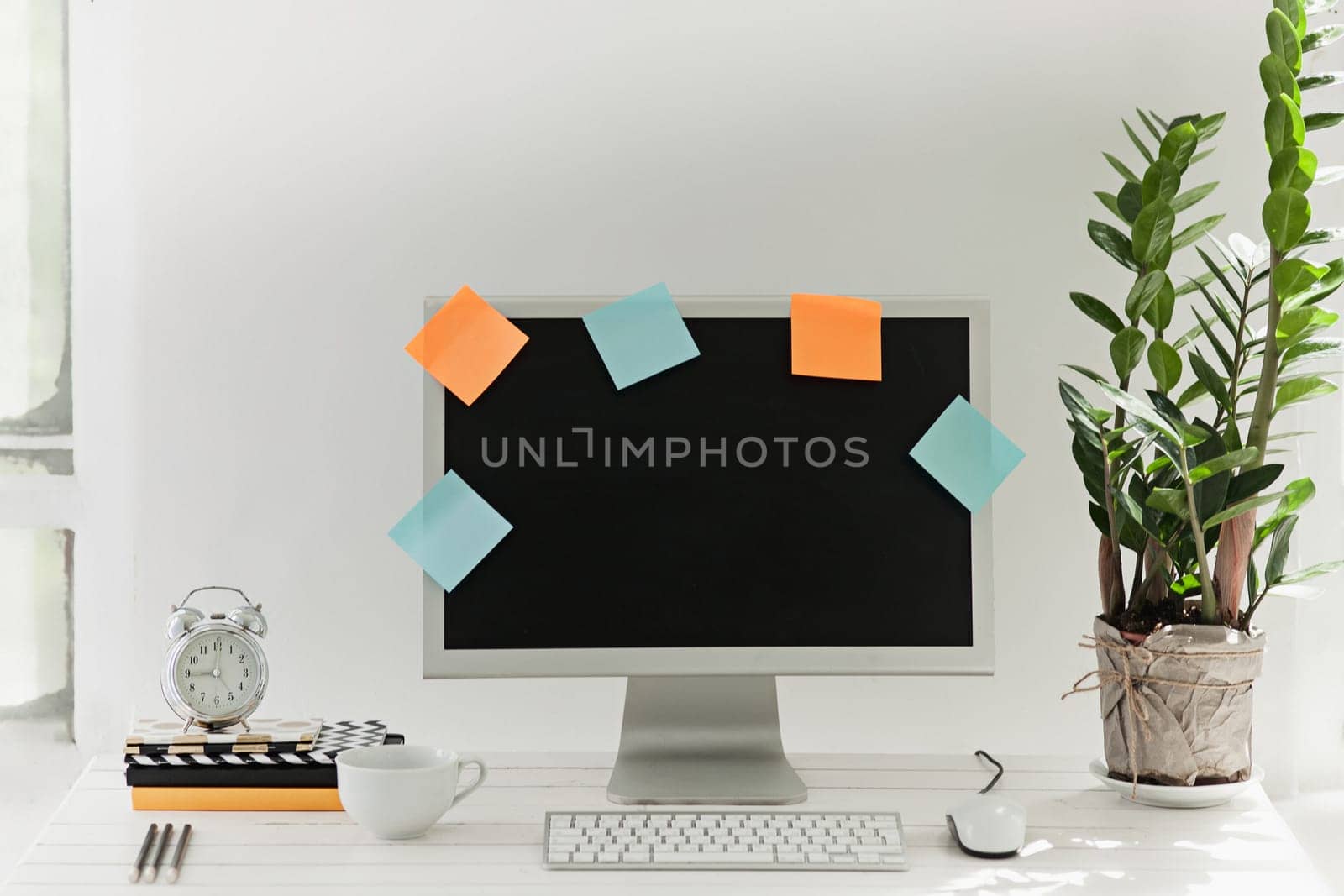 Stylish white workspace with computer at home or studio