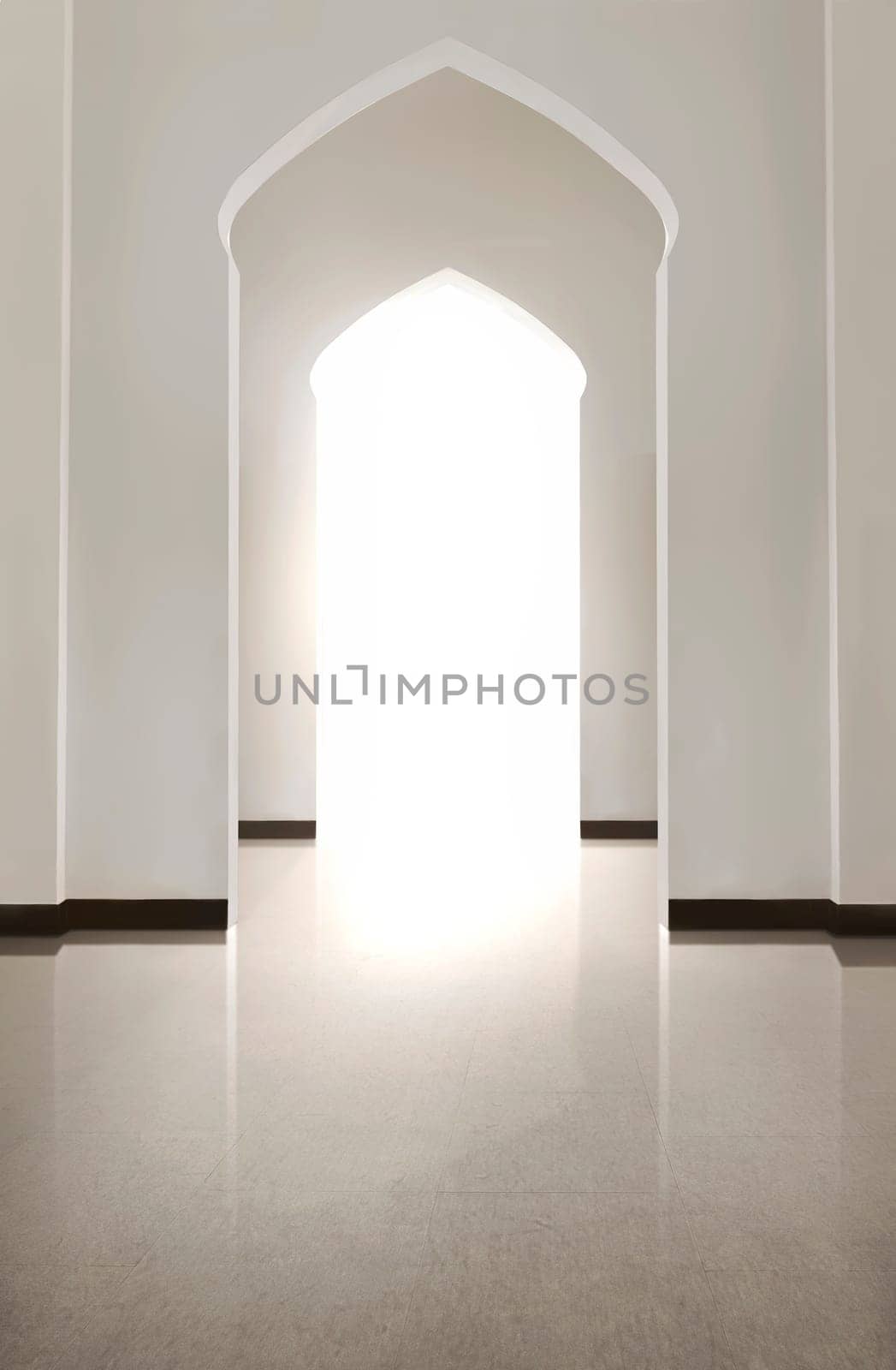 Portrait of arch door with tiled floor and white wall inside the mosque