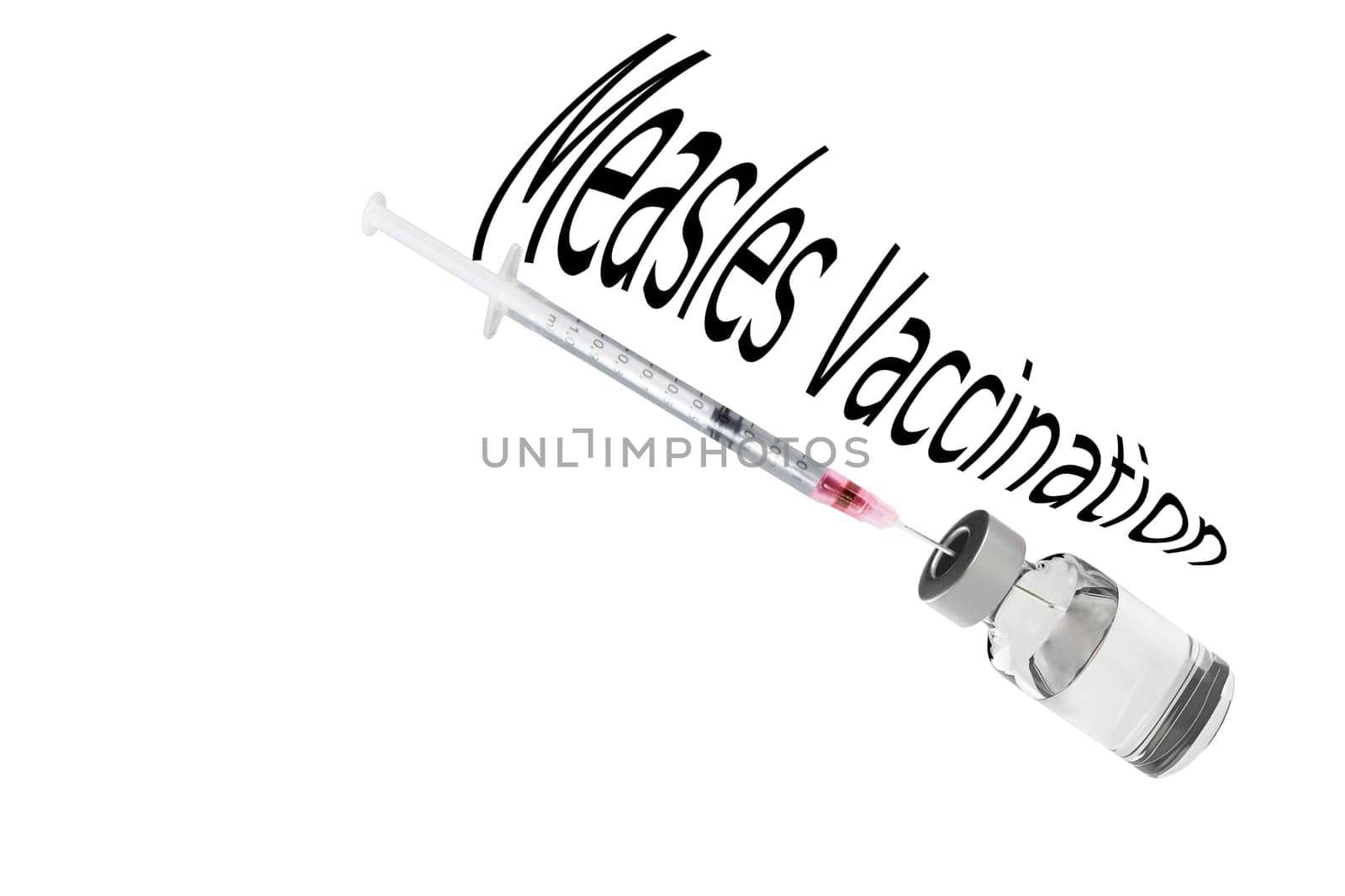 Close-up,view of a syringe and a bottle of medical fluid..