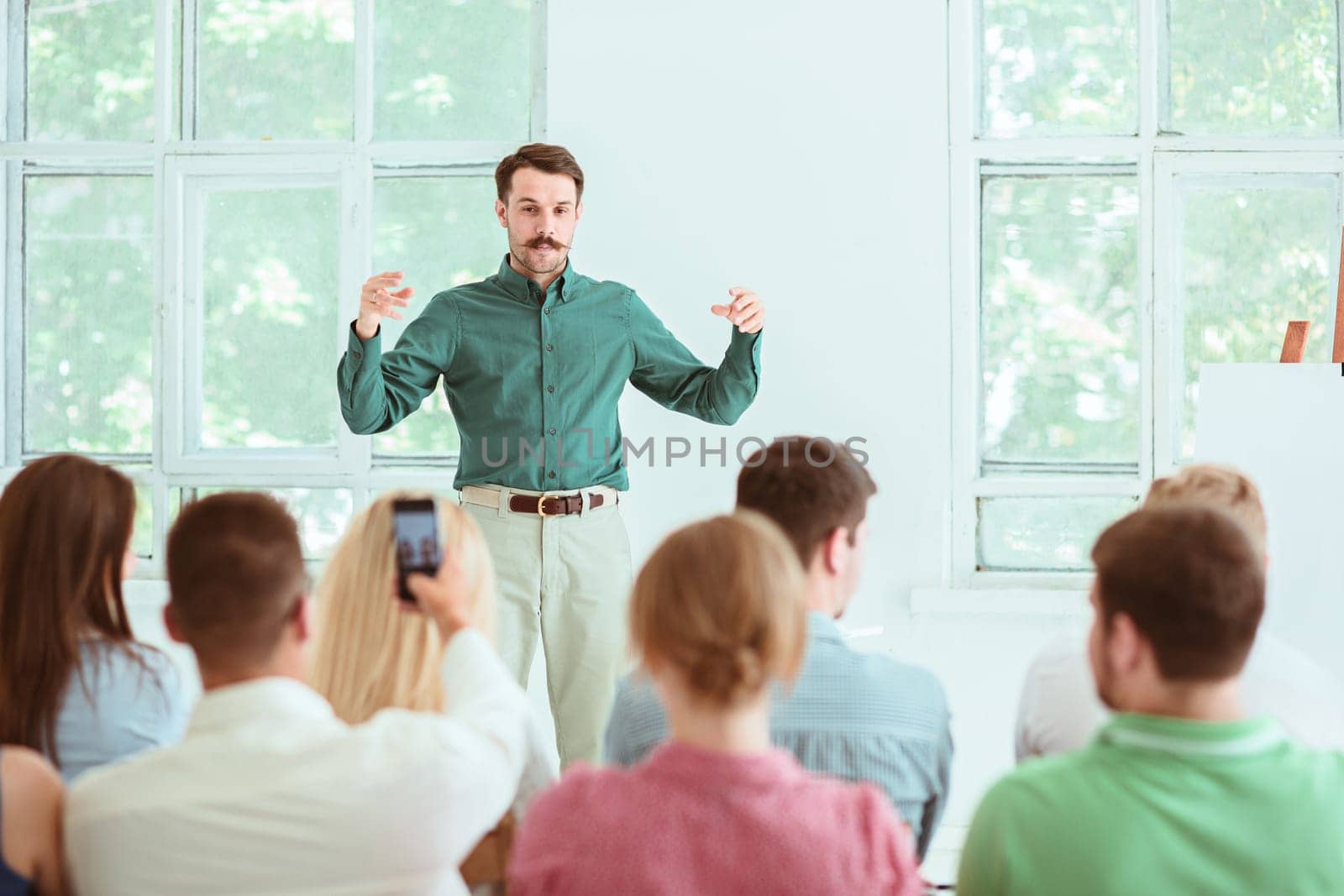 Speaker at Business Meeting in the conference hall. Business and Entrepreneurship concept.