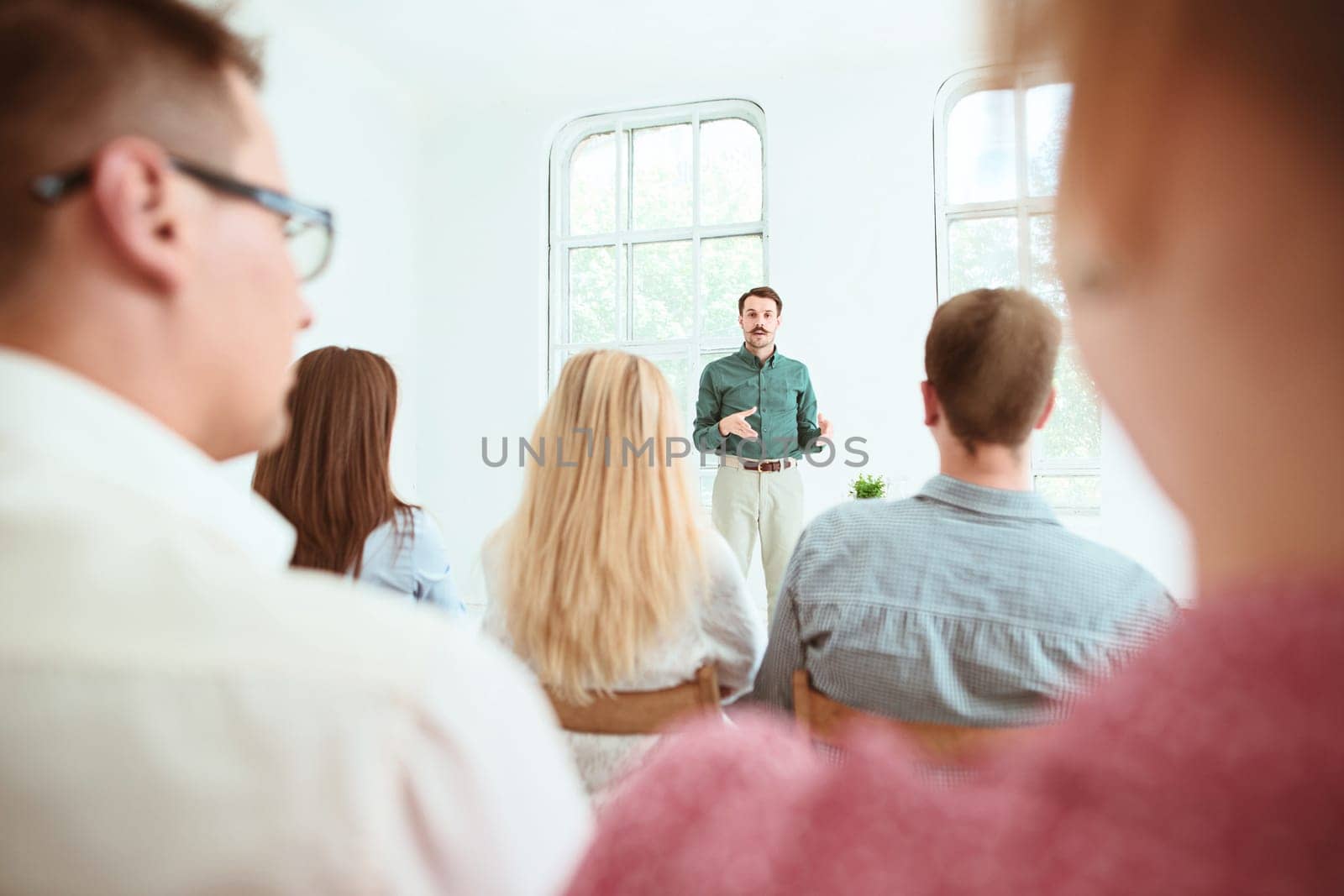 The people at Business Meeting in the empty conference hall. Business and Entrepreneurship concept.