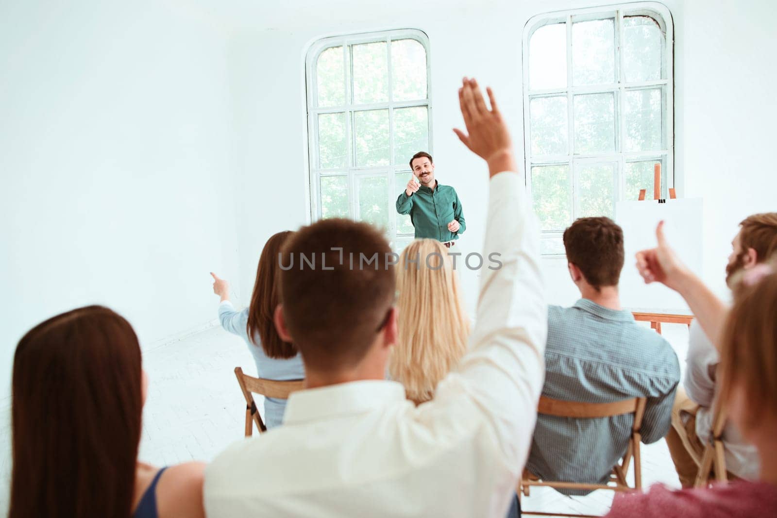 The people at Business Meeting in the empty conference hall. Business and Entrepreneurship concept.