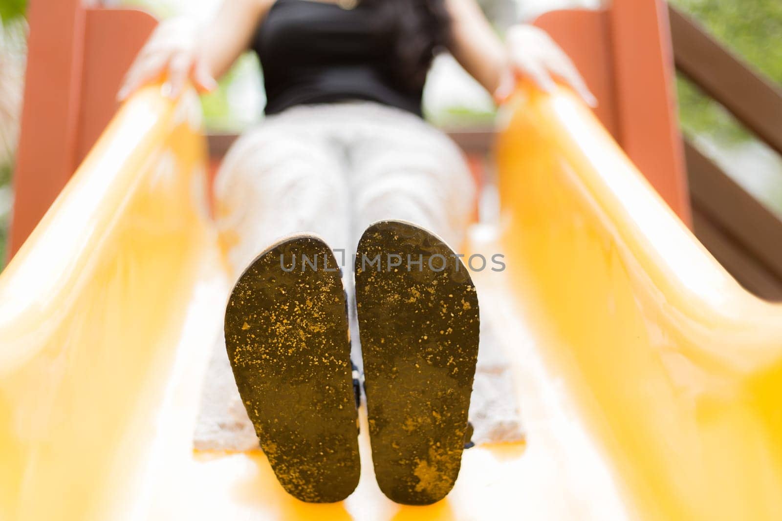 Children playground, yellow blue slider