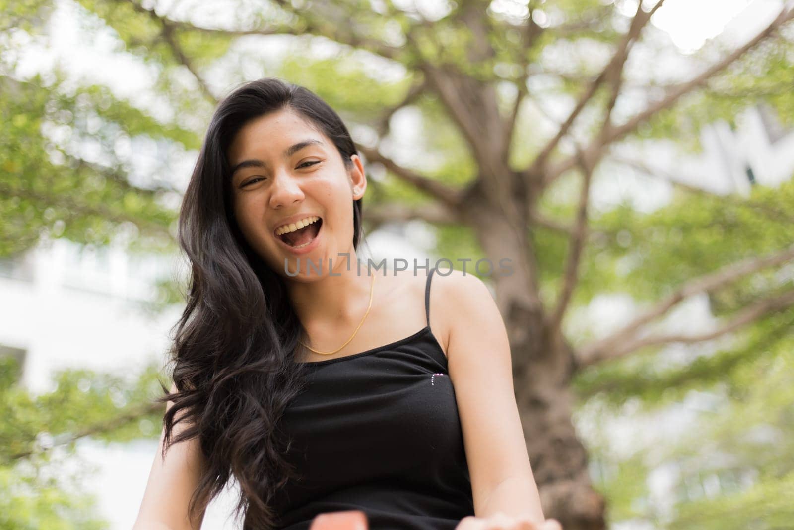 A portrait of a beautiful asian woman smiling