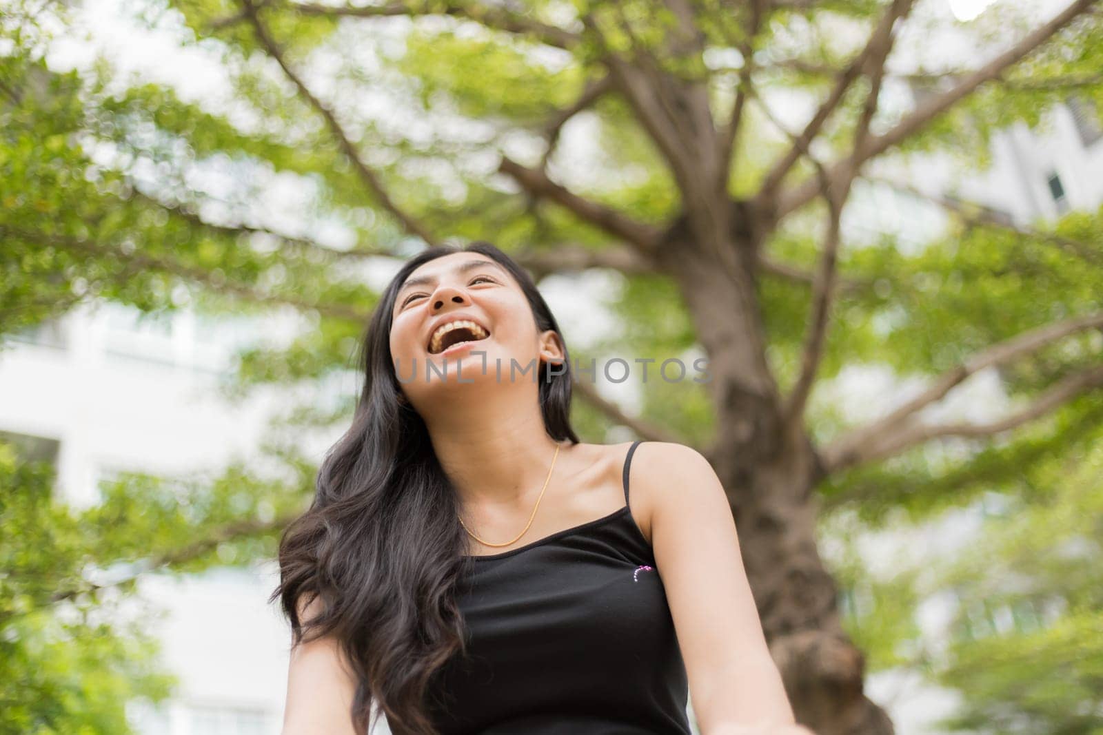 A portrait of a beautiful asian woman smiling