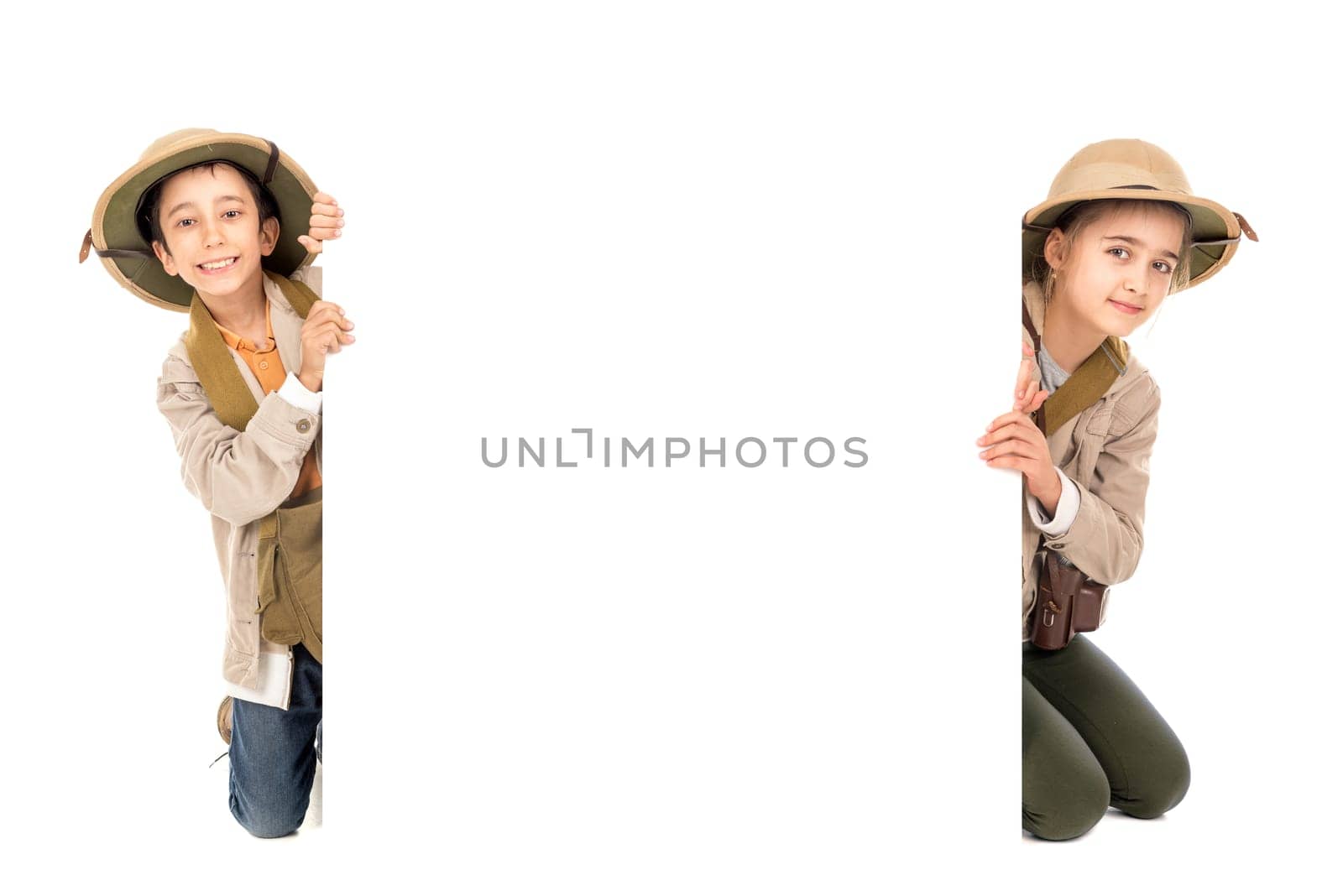 Young couple playing Safari isolated in white