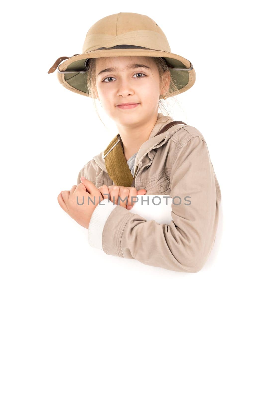 Young girl with safari costume isolated in white