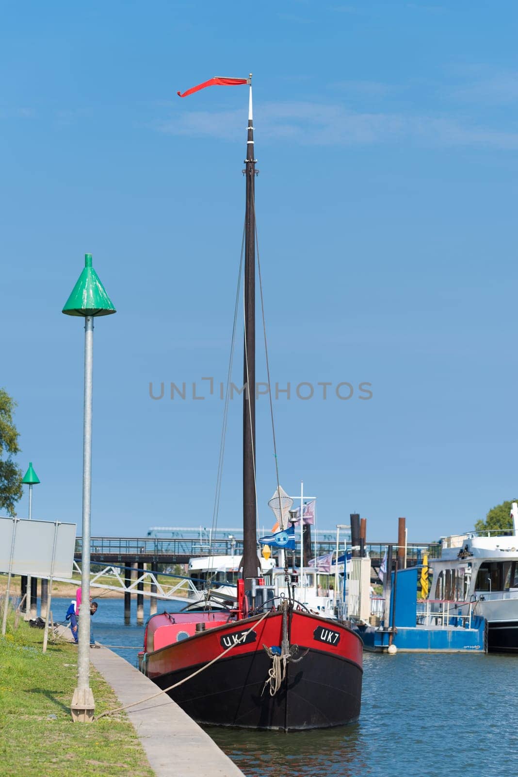DEVENTER, NETHERLANDS - AUGUST 27, 2016: Fishing trawler with Urker registration number. Urk has by far the largest fishing fleet and fish processing industry in the Netherlands.
