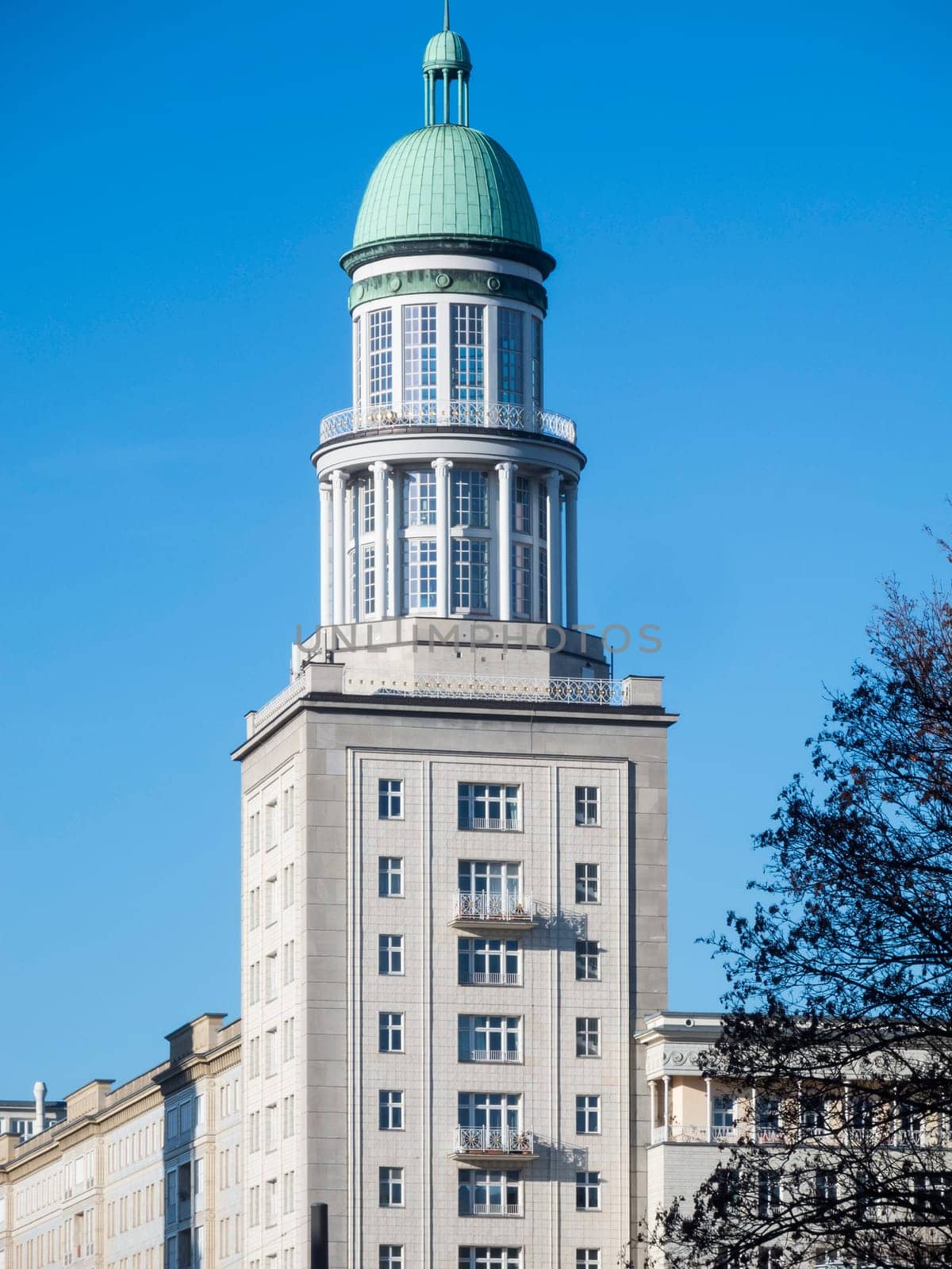 View of the North Tower at Fankfurter Tor with blue sky in Berlin in 2017. This tower contains the gallery in the tower.
