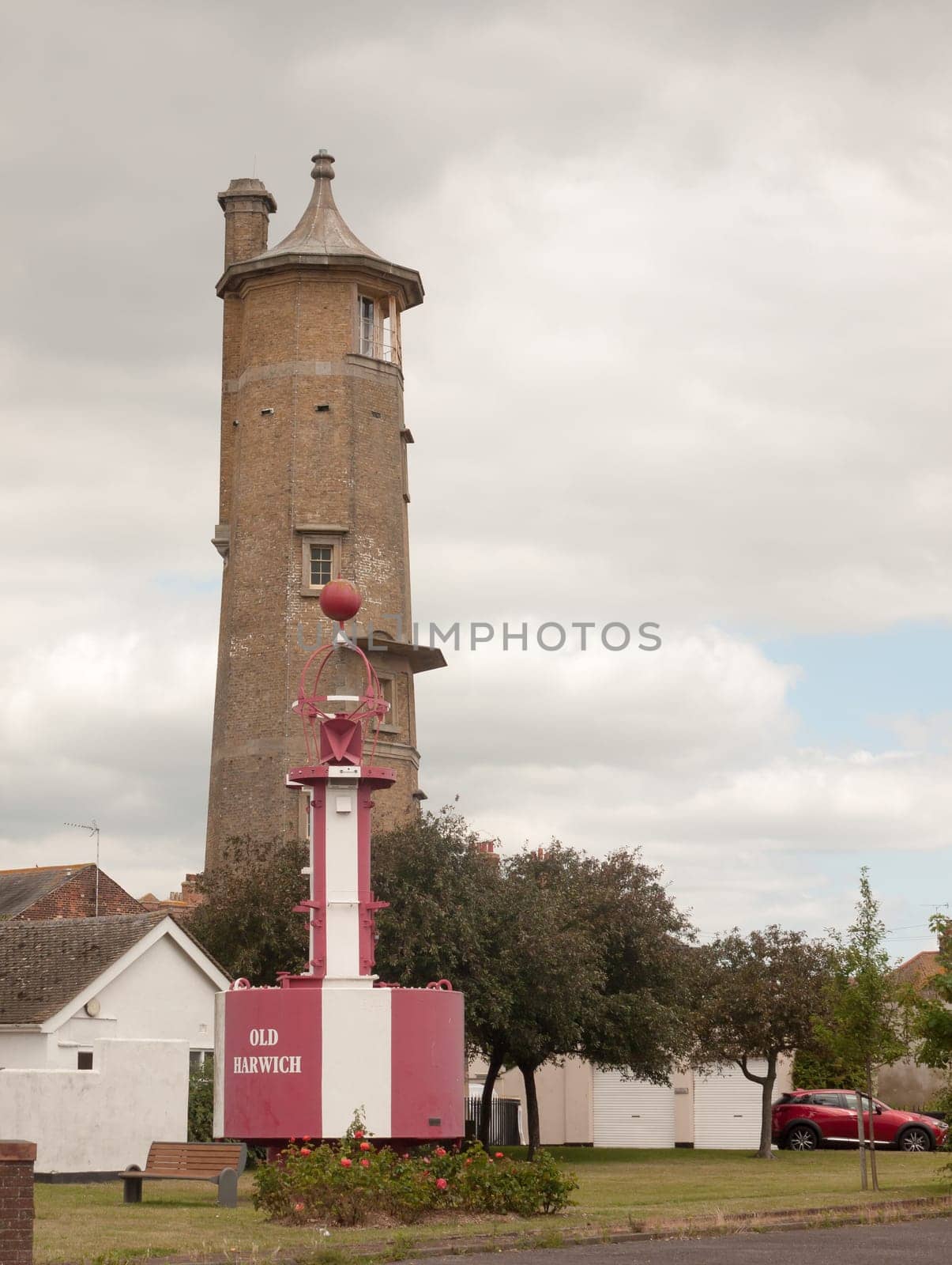tower and red and white sea structure outside on cloudy day in harwich port