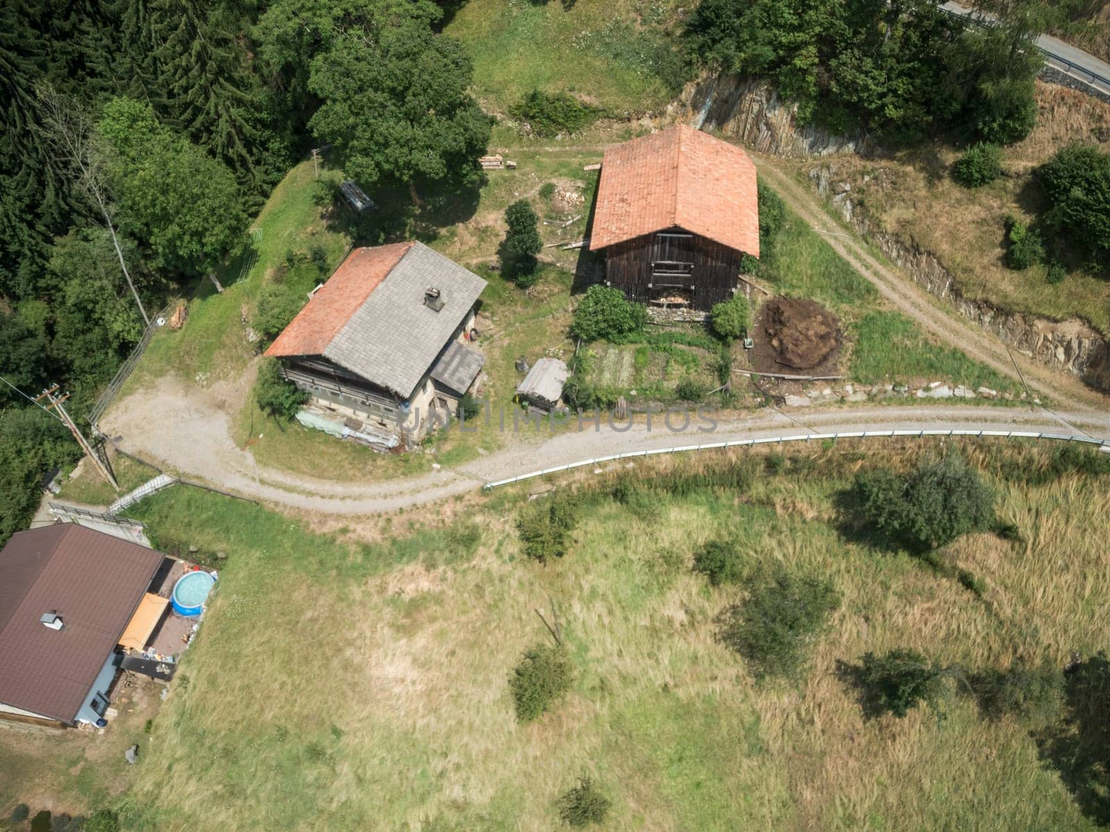 Small mountain farm above Merano in bird's eye view. Taken from a cable car.