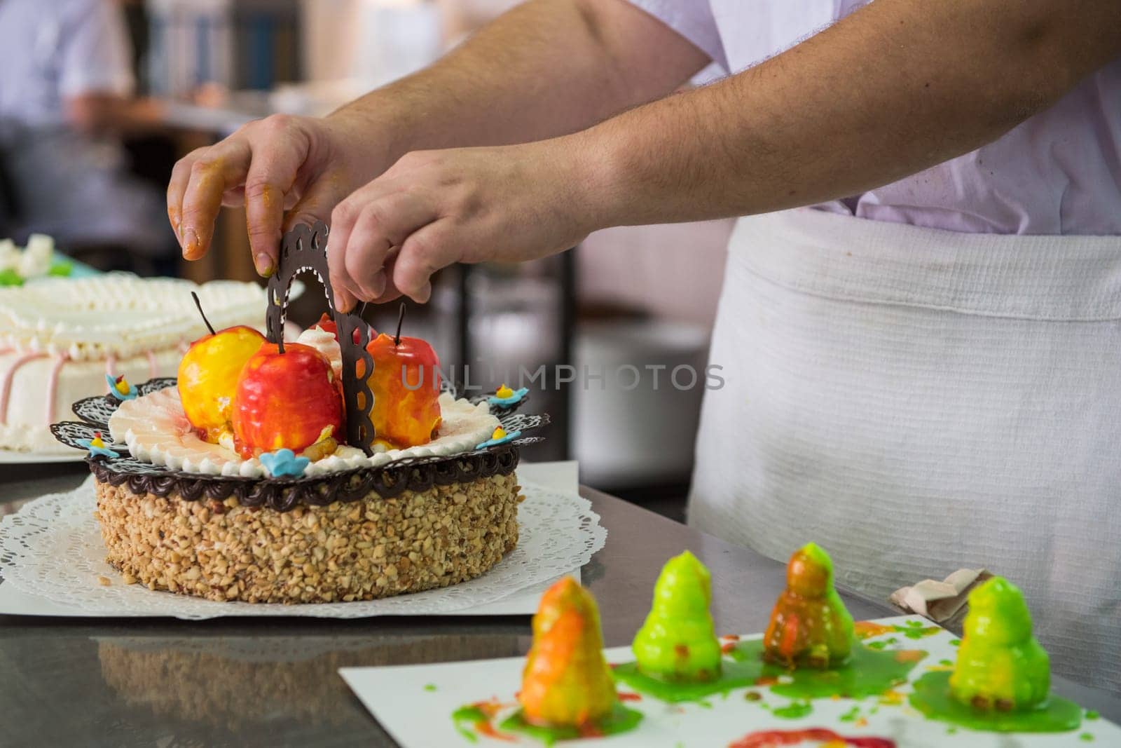 Manual cakes production on factory