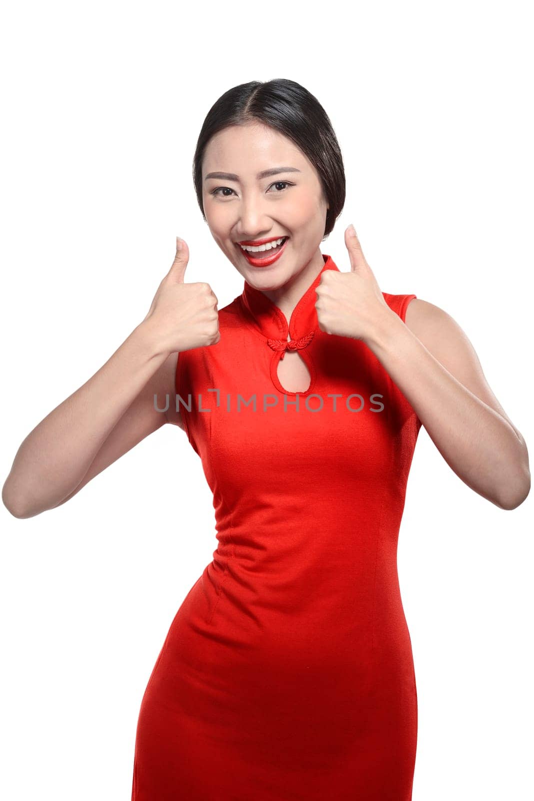 Chinese woman in cheongsam dress show thumbs up. Happy chinese new year concept